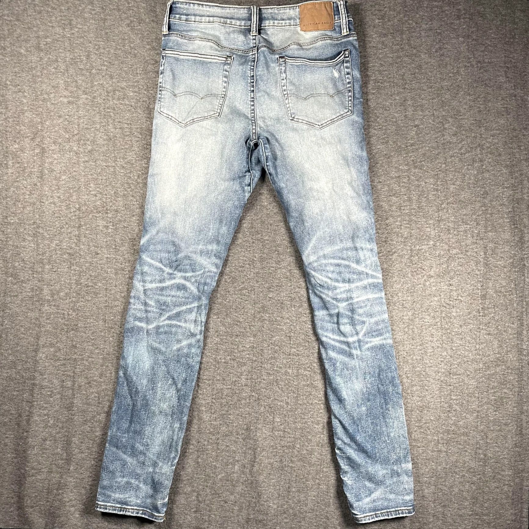American Eagle Outfitters American Eagle Jeans Mens 32x34 Light Wash AirFlex+ Move-Free Skinny Distressed Jeans Mens Regular 32x34 Blue 5-Pocket Distressed Comfortable Size US 32 / EU 48 - 3 Thumbnail
