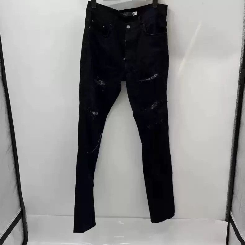 Amiri's latest black zebra print distressed jeans