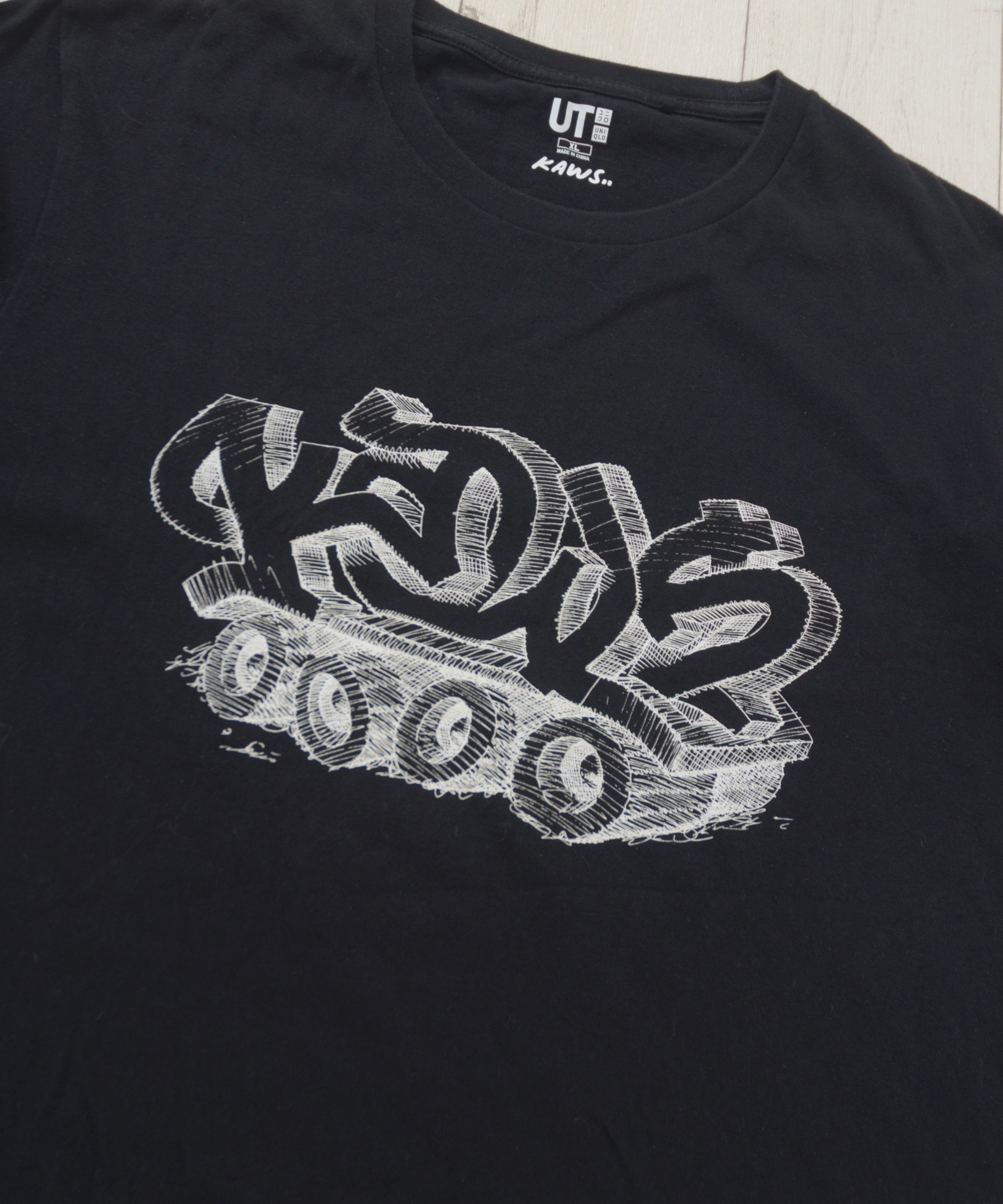 Kaws × Uniqlo Kaws x Uniqlo UT Graffiti Tank Black T-Shirt L size Size US XL / EU 56 / 4 - 5 Thumbnail
