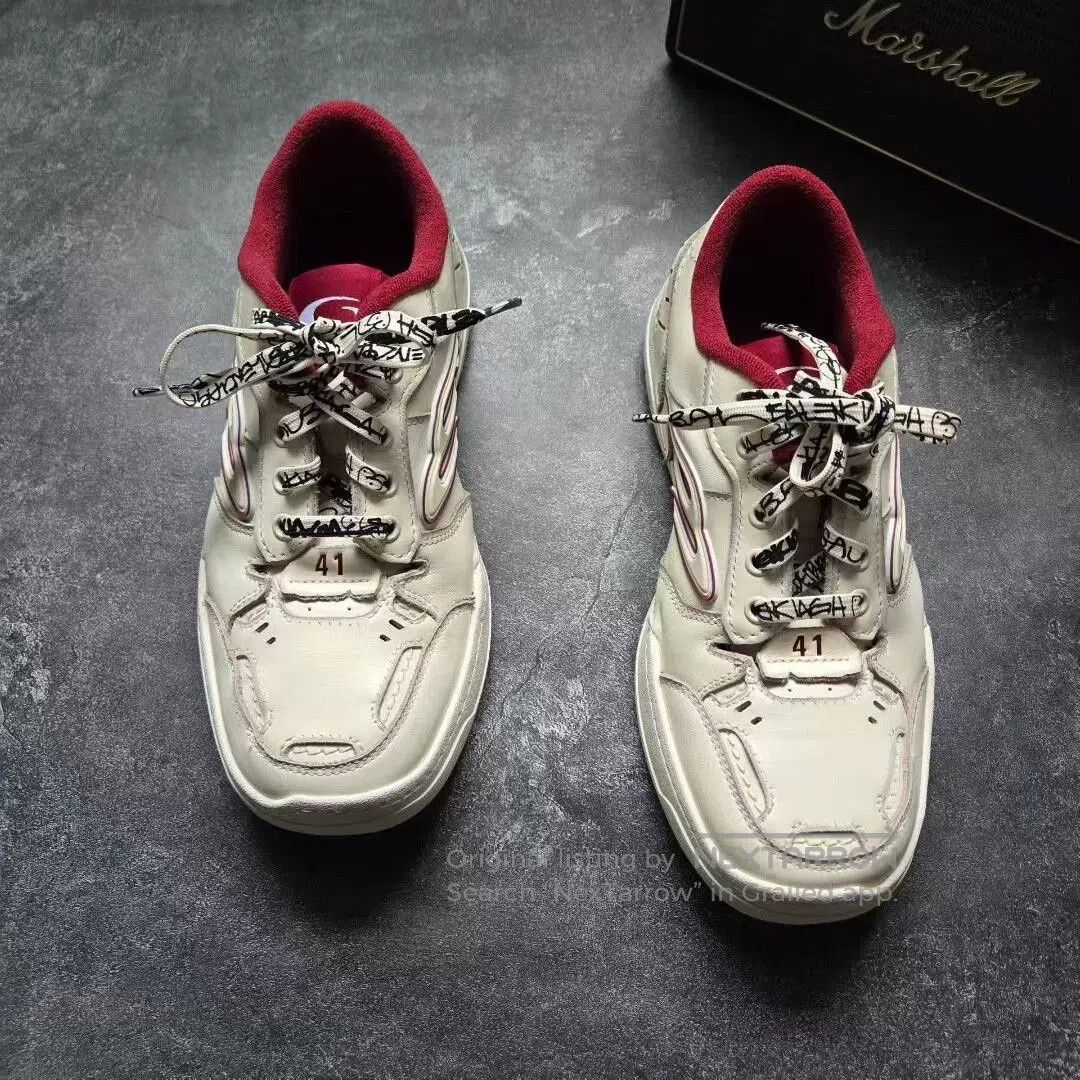 balenciaga hamptons white and red sneakers.