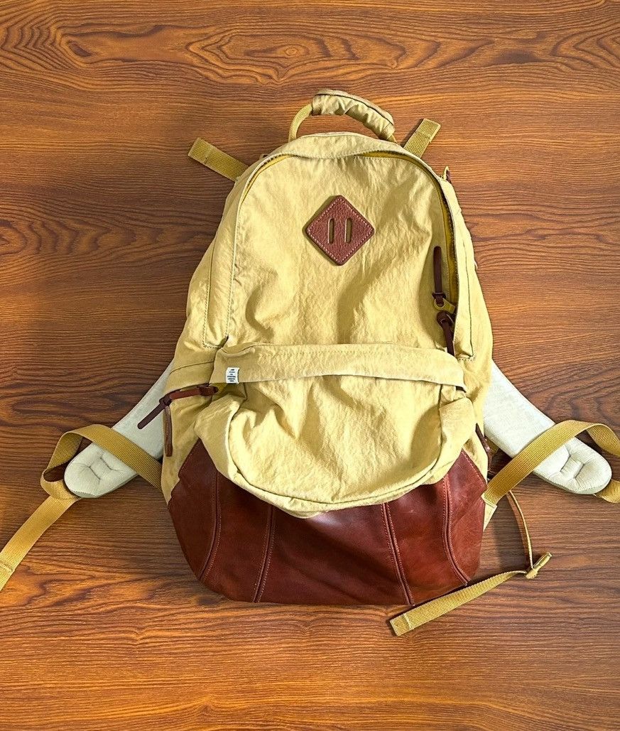 image of Visvim Lamina 22L Backpack in Yellow, Men's