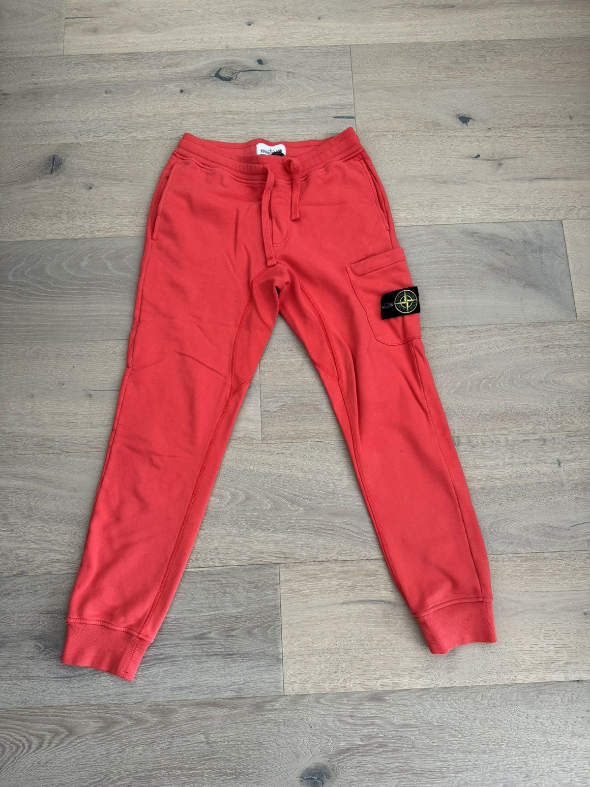 Image of Stone Island Sweatpants in Orange, Men's (Size 30)