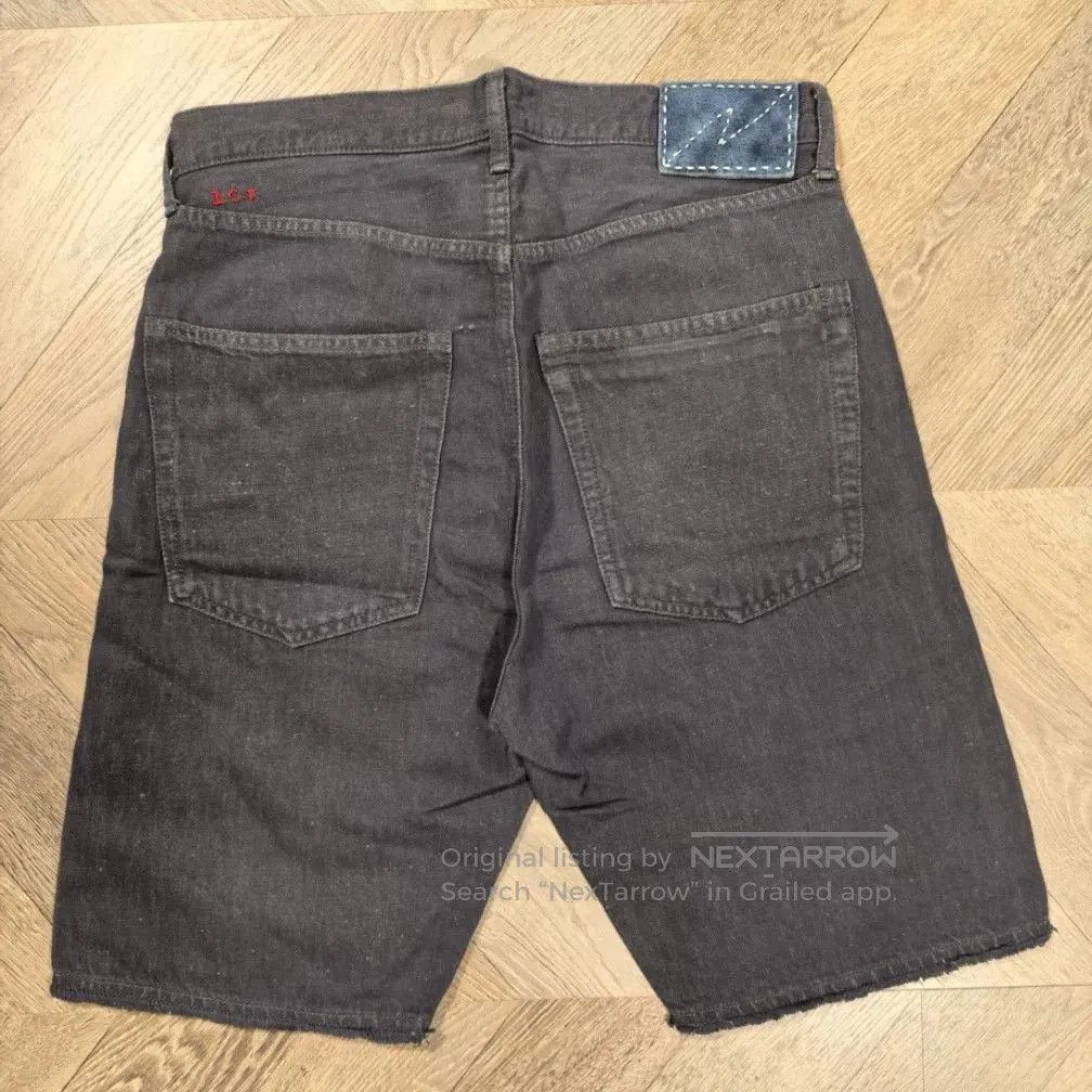 visvim cut off denim shorts with frayed details.