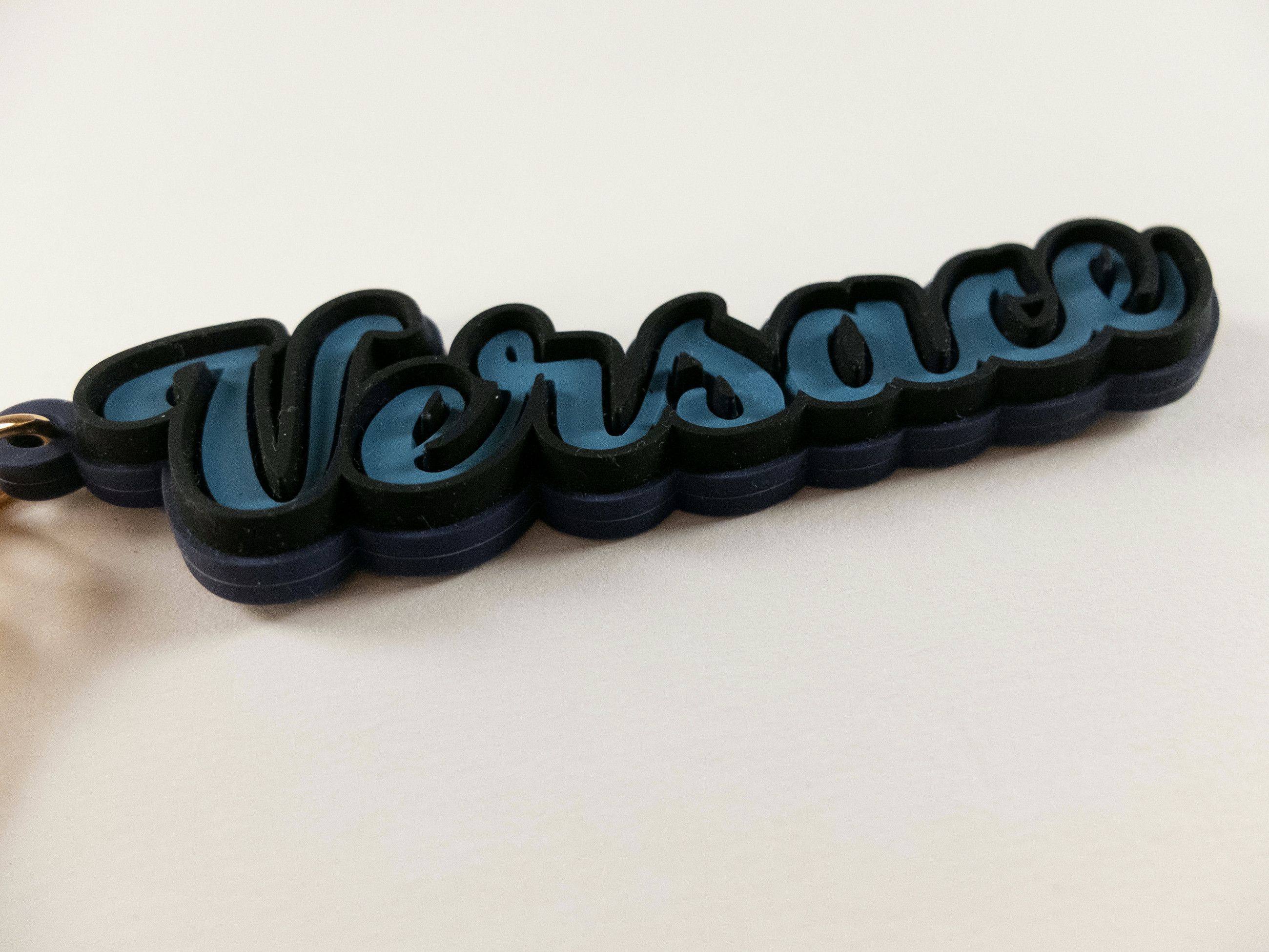 Versace VERSACE blue black logo pendant varsity silicone keyring Size ONE SIZE - 3 Thumbnail