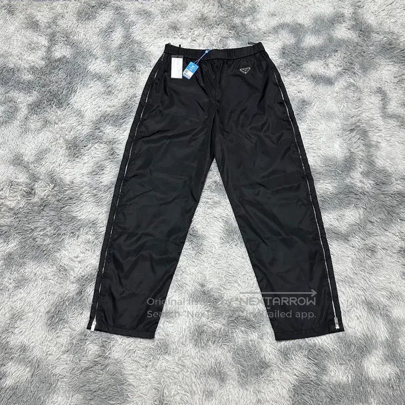 Prada Prada Triangle logo side-zip nylon trousers black size 44 Size US 28 / EU 44 - 1 Thumbnail