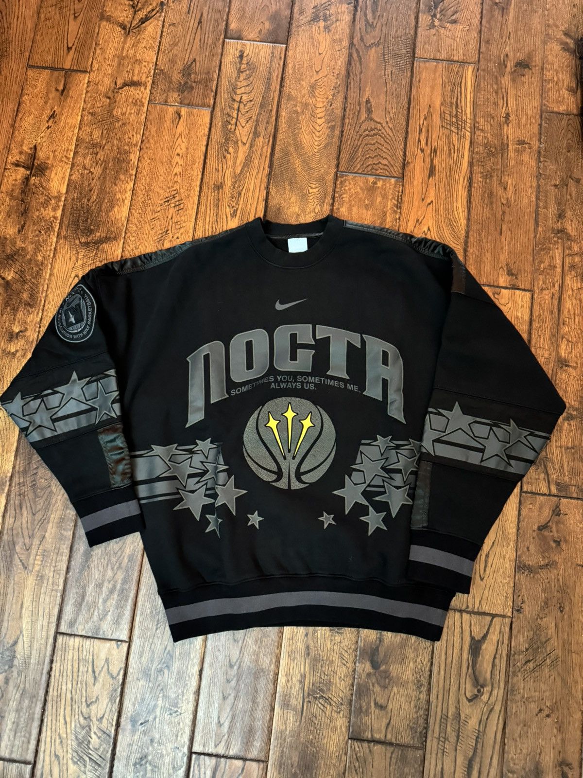 image of Drake x Nike Nocta Champions League Crewneck in Black, Men's (Size Medium)