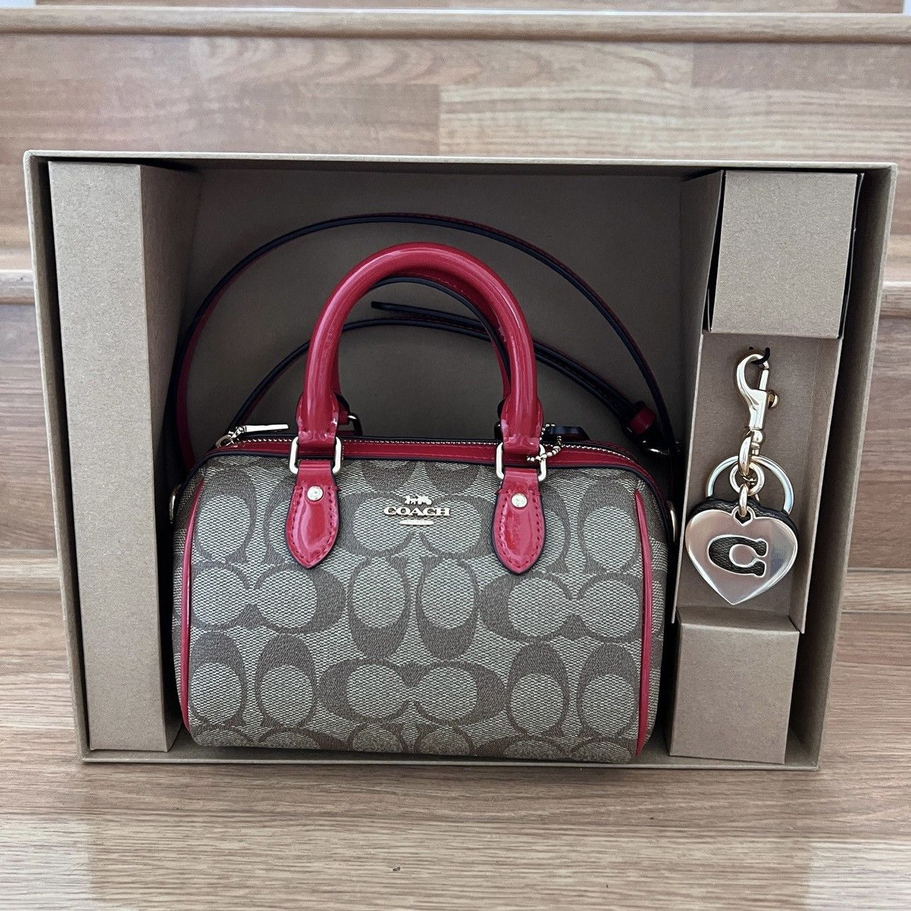 image of Coach Coach Boxed Mini Rowan Crossbody With Hearts Key Ring in Brown, Women's
