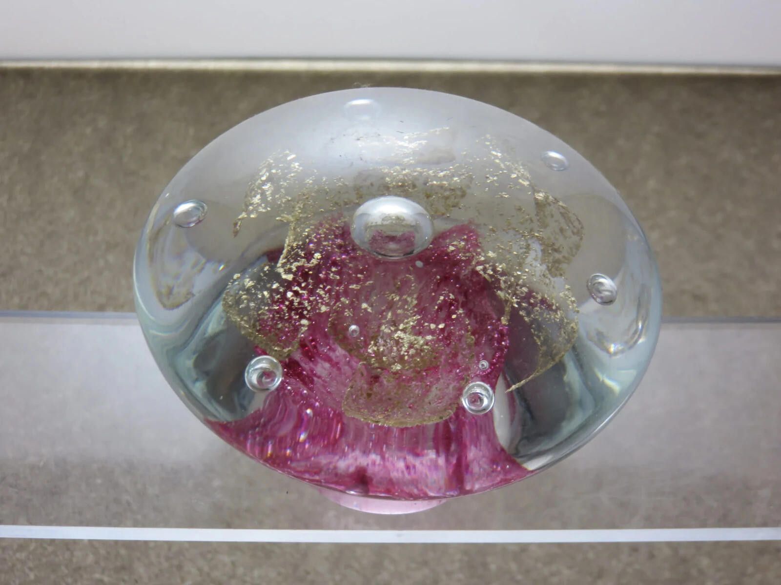 The Unbranded Brand Art Glass Paperweight Air Bubbles Pink And Gold Flakes. Size ONE SIZE - 2 Thumbnail