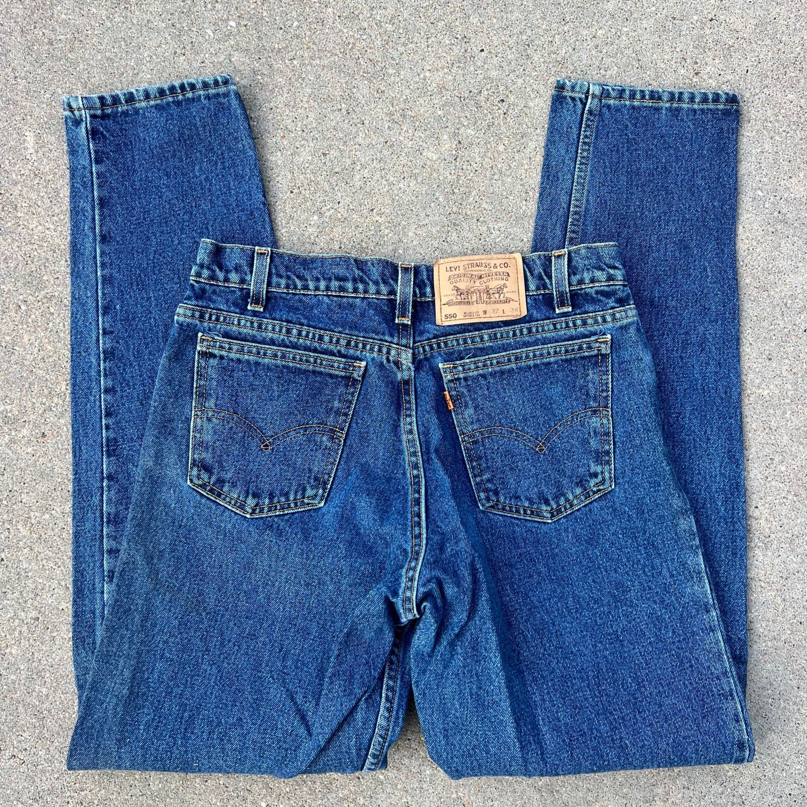 90s Levi's 550 relax fit tapered leg orange tab jeans 32x34