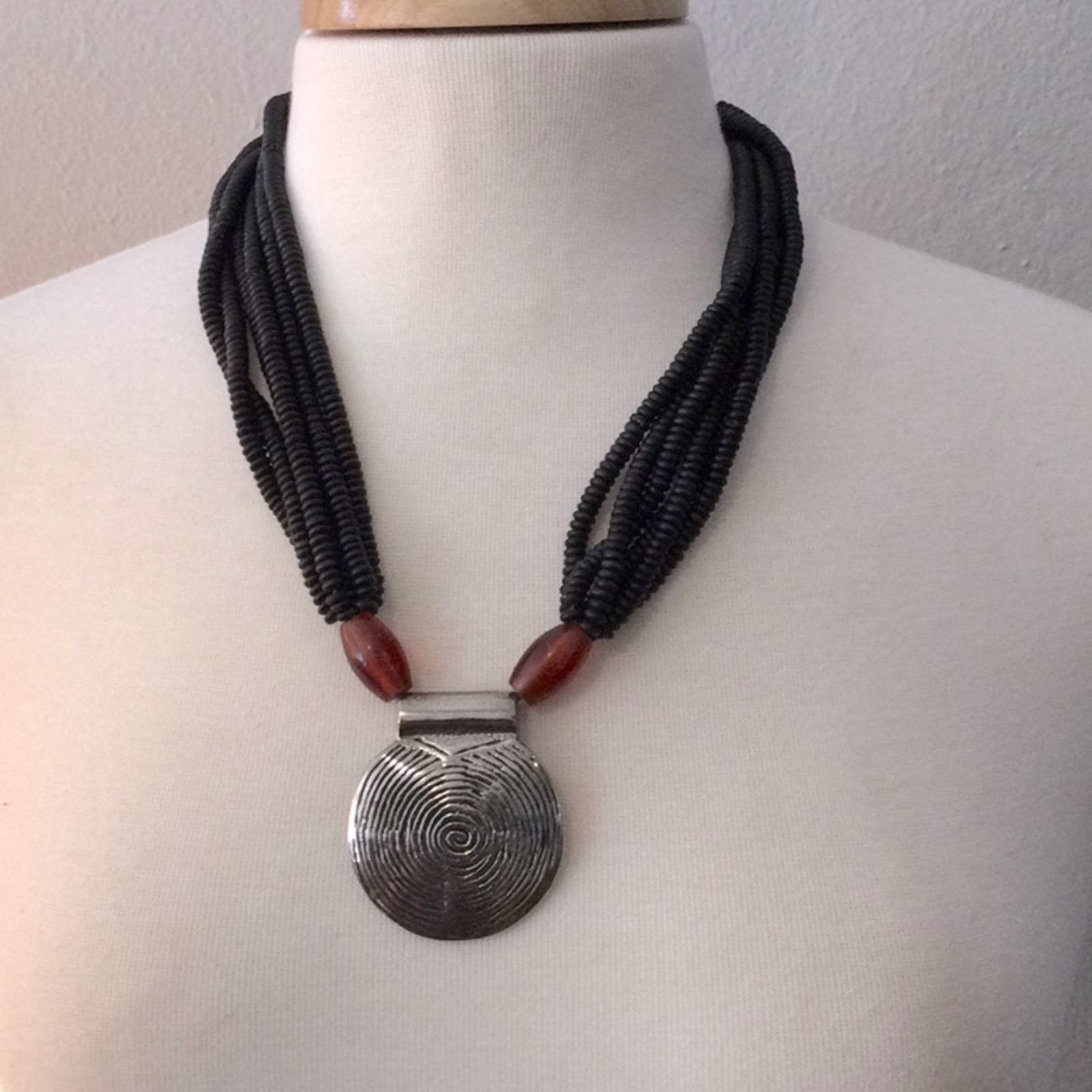 Black Multi-Strand Necklace with Silver Pendant