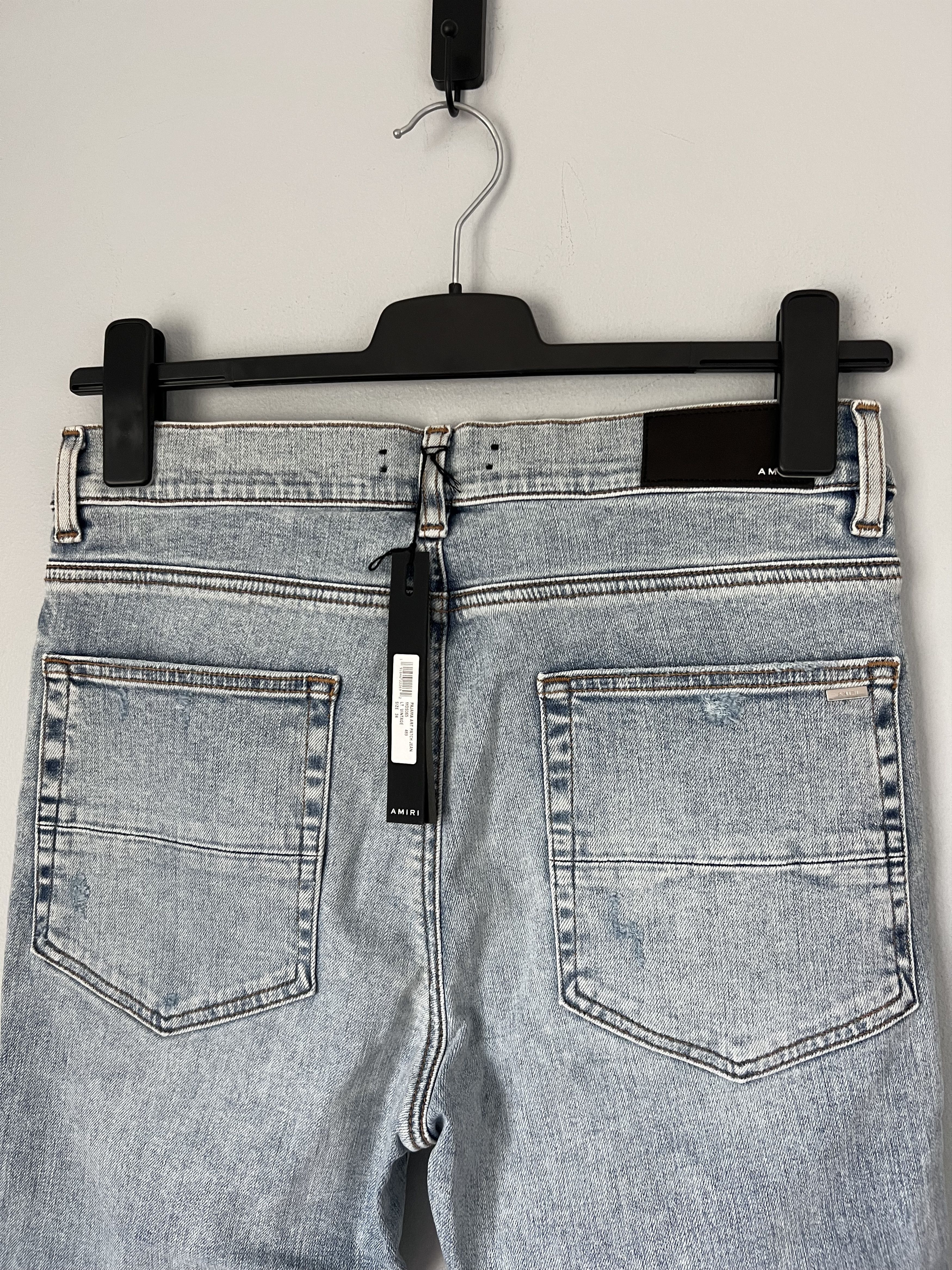 Amiri Pajama Art Patch Skinny Jeans in Light Vintage Blue