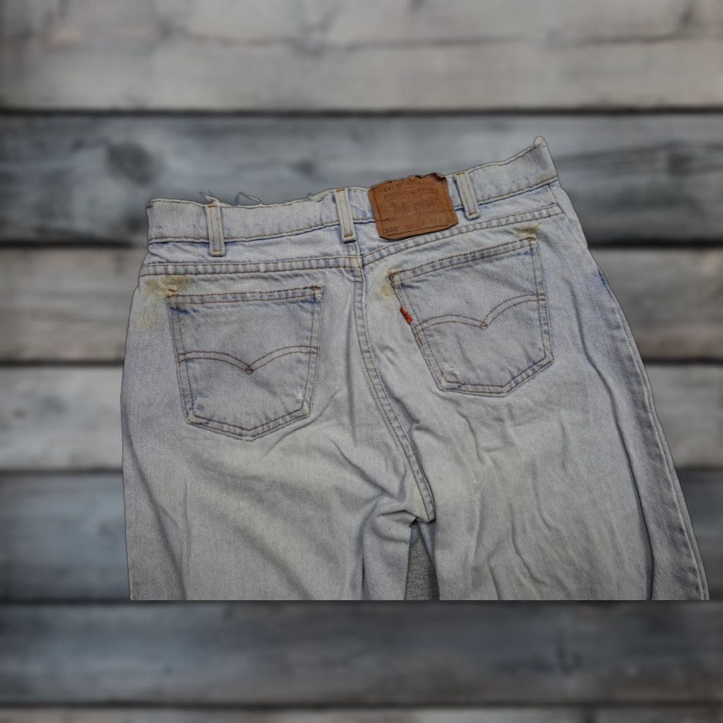 Levi's VINTAGE Levi's 550 Jeans Mens 33x32 Distressed Relaxed Tapered Denim Light Blue 90s Grunge Womens? Mens Size US 33 - 1 Thumbnail