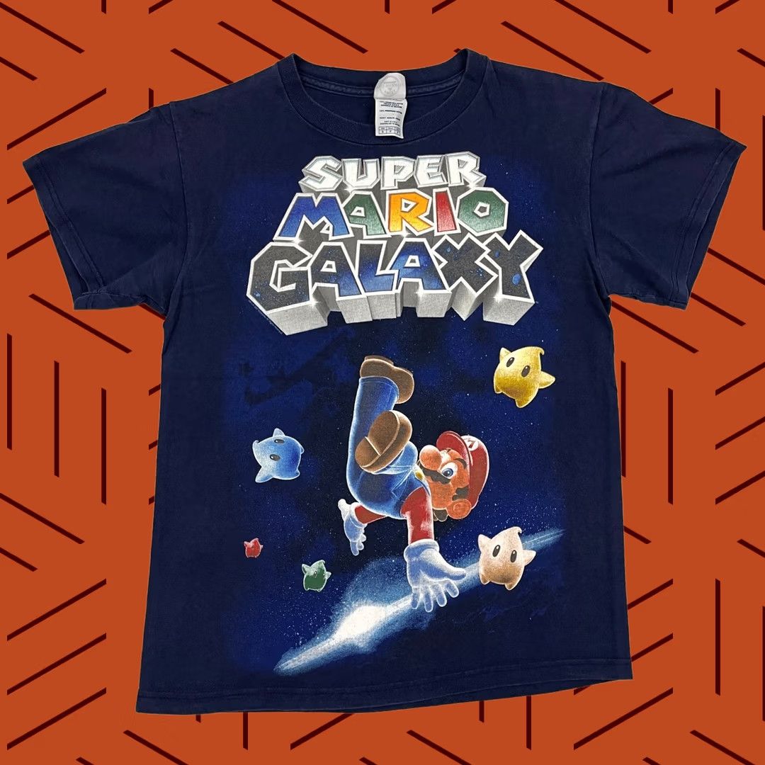 Delta New title: 2007 Super Mario Galaxy Shirt Men S Blue Nintendo Wii Video Game Promo Graphic Size US S / EU 44-46 / 1 - 1 Thumbnail
