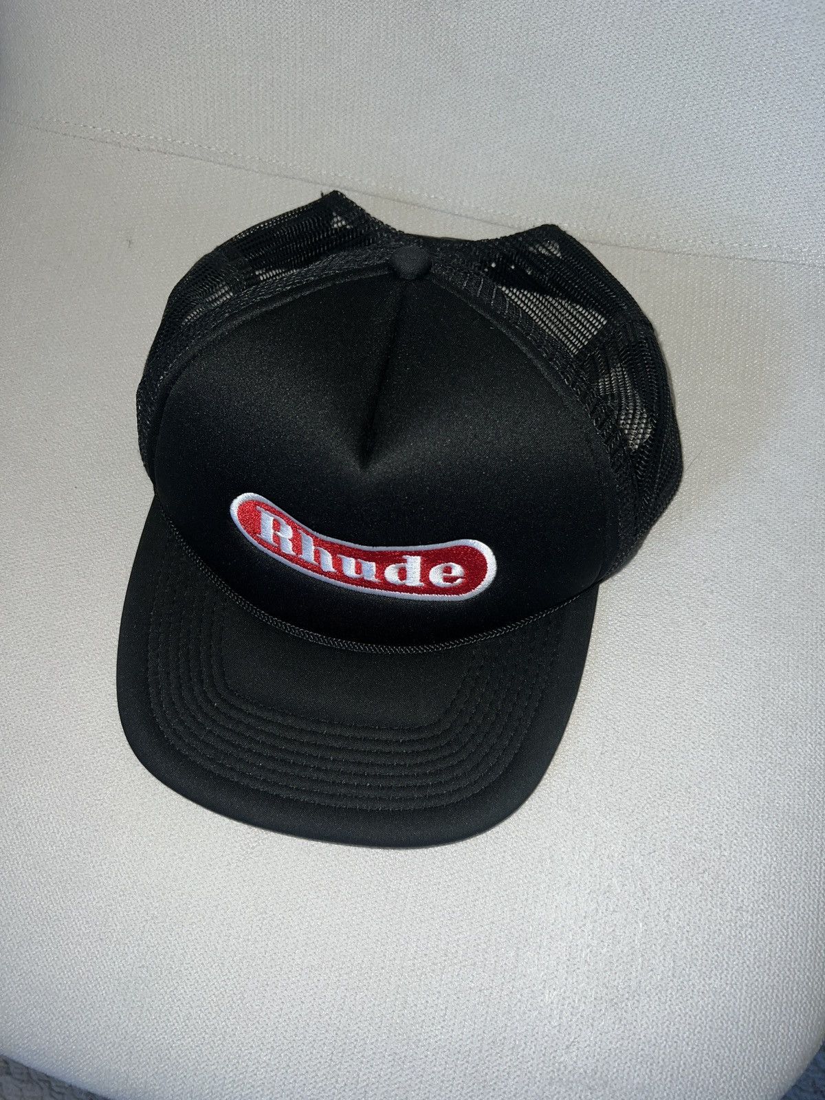 image of Rhude Pit Stop Trucker Cap in Black, Men's