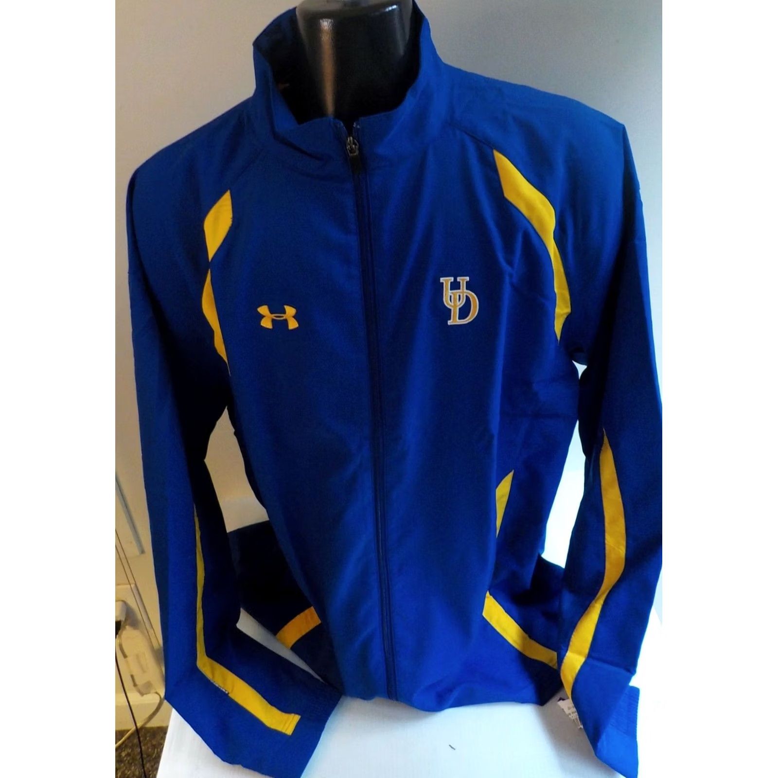 Under Armour UNDER ARMOUR Allseason Jacket Mens 2XL Zip Front Rain Blue Gold NWT Windbreaker Casual Front Zip Pockets UD Chest Back Neck DELAWARE, USA Size US XXL / EU 58 / 5 - 2 Thumbnail