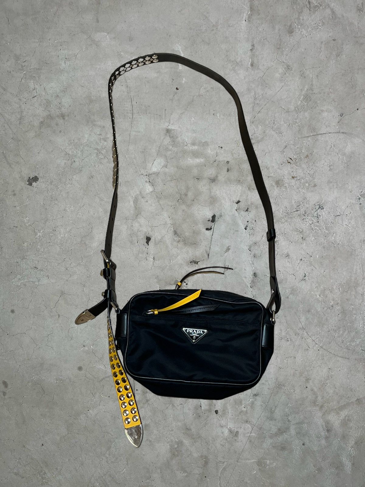 image of Prada New Vela Studded Side-Bag in Black, Men's