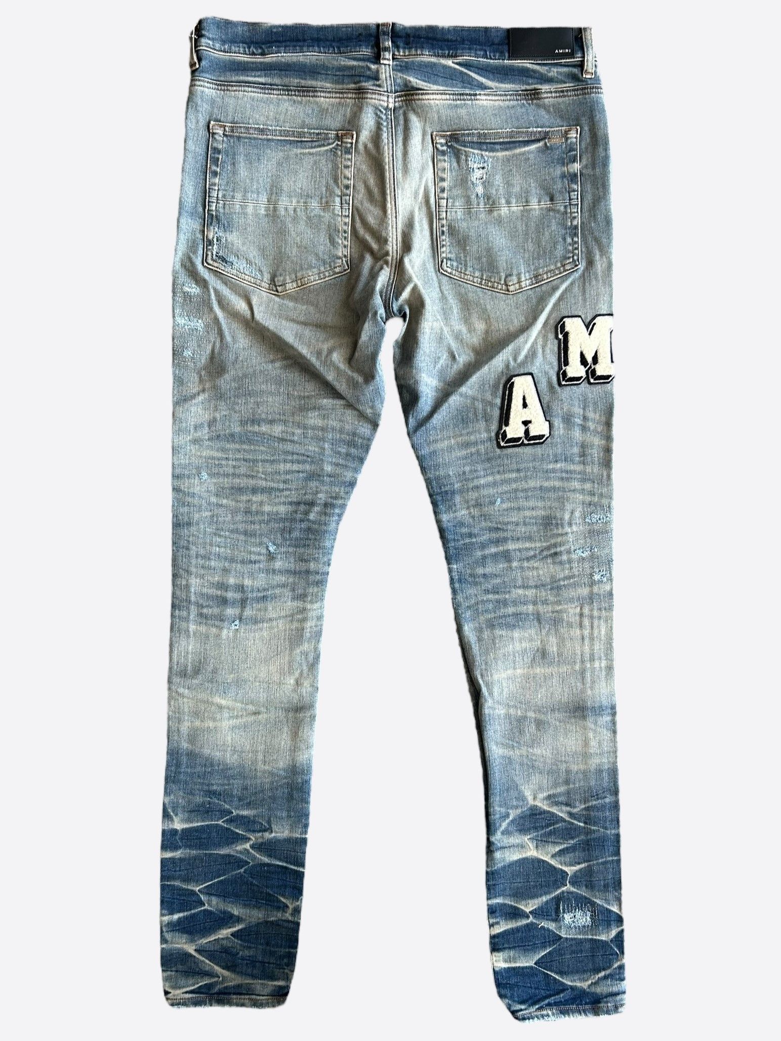 Amiri Amiri Vintage Indigo Varsity Applique Logo Jeans | Grailed