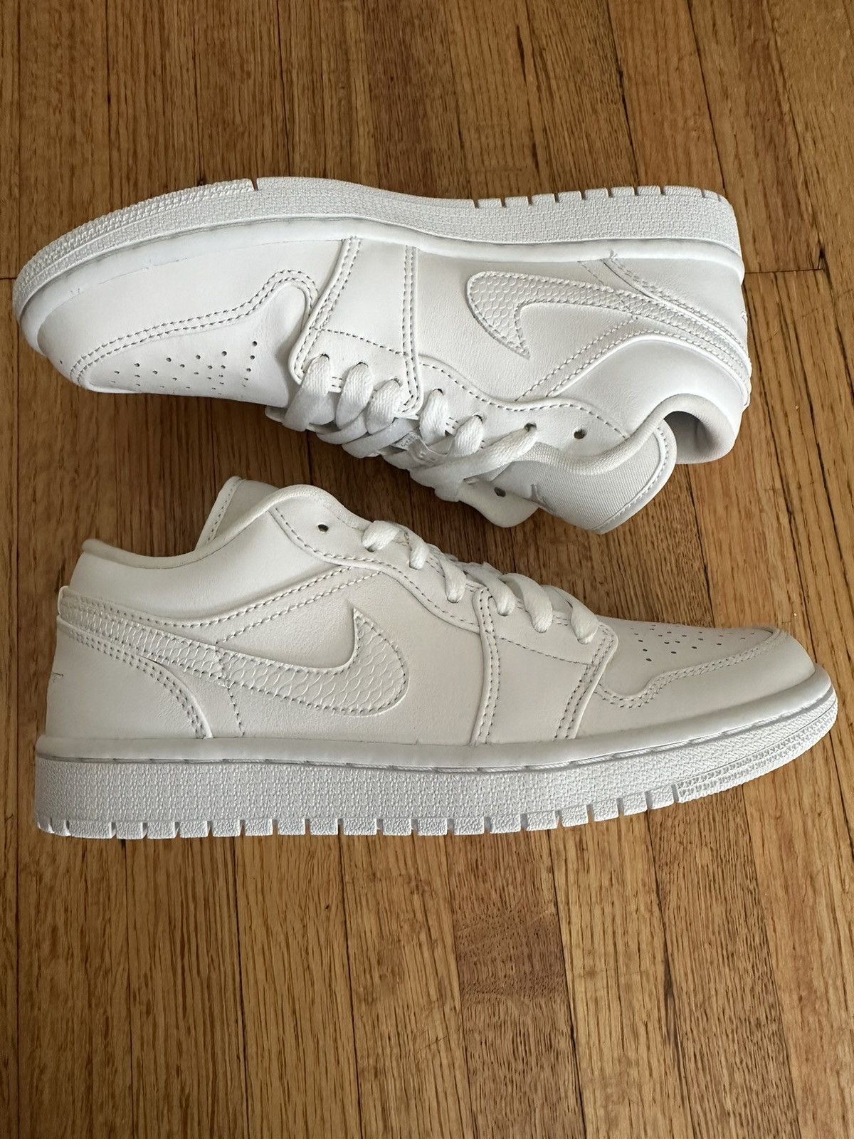 image of Nike Jordan 1 Low Shoes in White, Women's (Size 6.5)