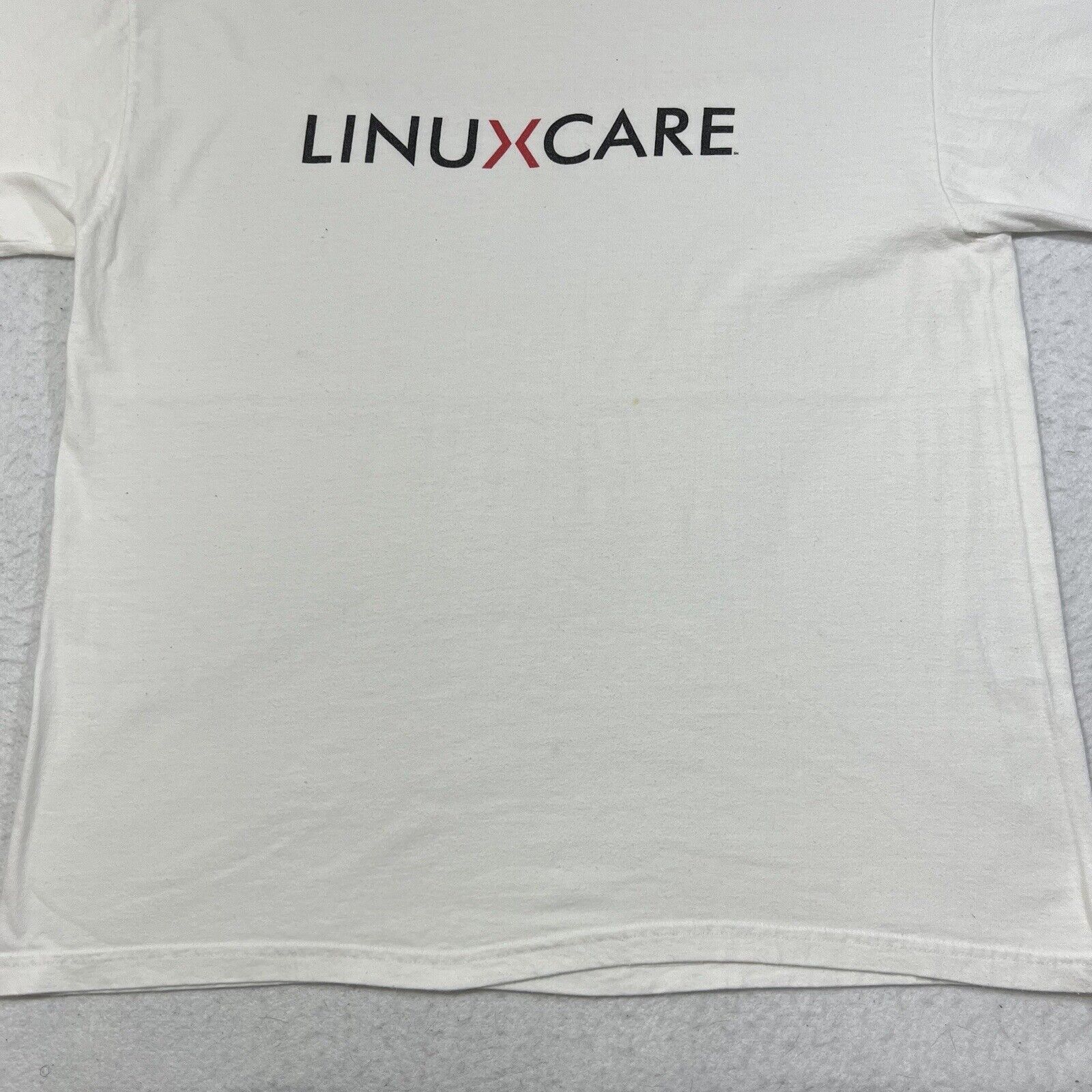 Hanes Vintage Linuxcare White Tee Graphic T Shirt Hanes Size US L / EU 52-54 / 3 - 6 Thumbnail