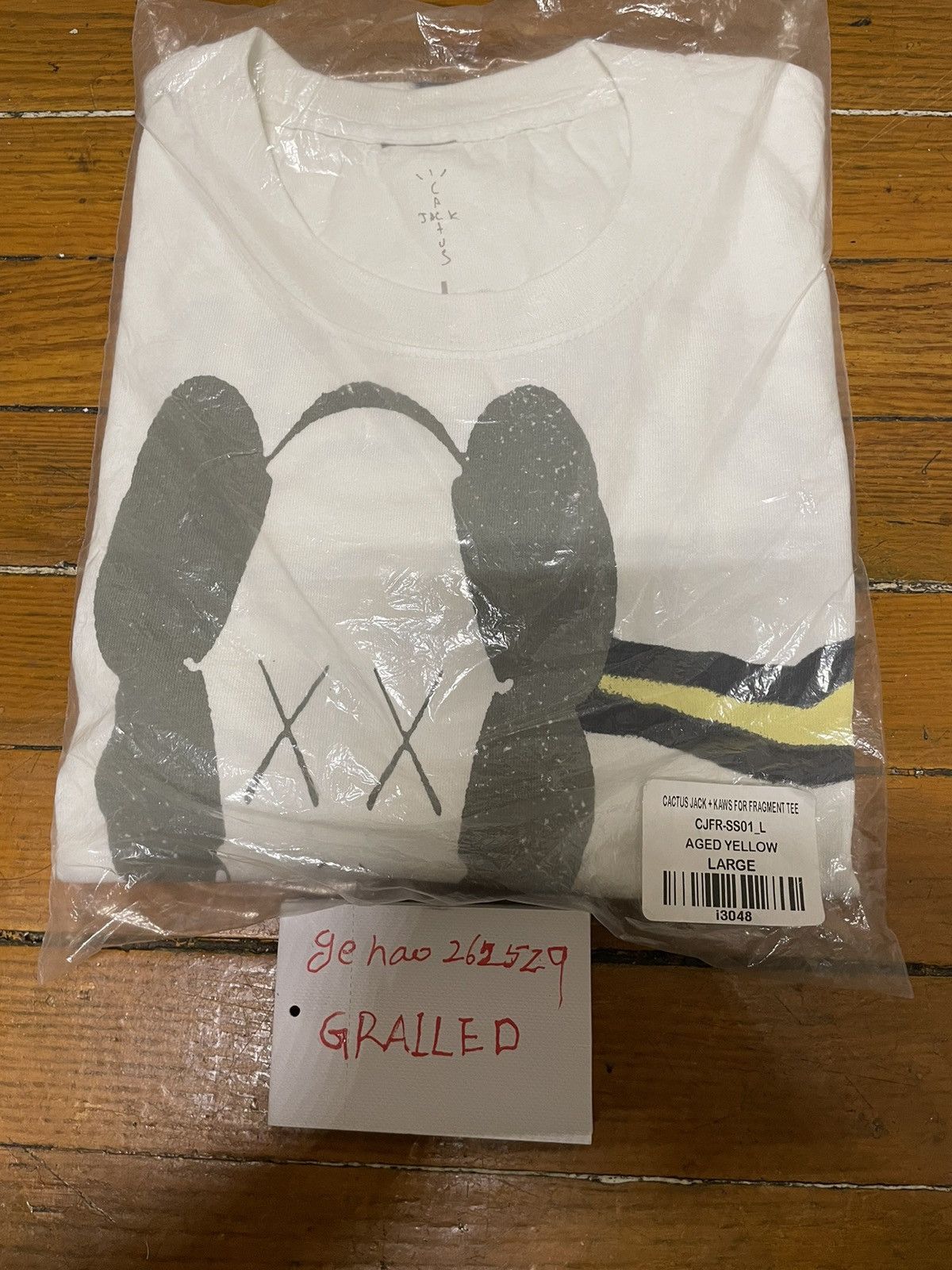 fragment kaws tee