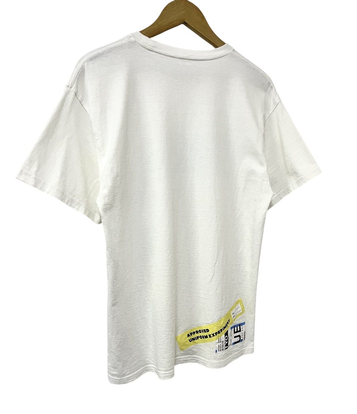 uniform experiment UNIFORM EXPERIMENT SOPHNET ATTENTION TAG JAPANESE TSHIRT Size US M / EU 48-50 / 2 - 7 Thumbnail