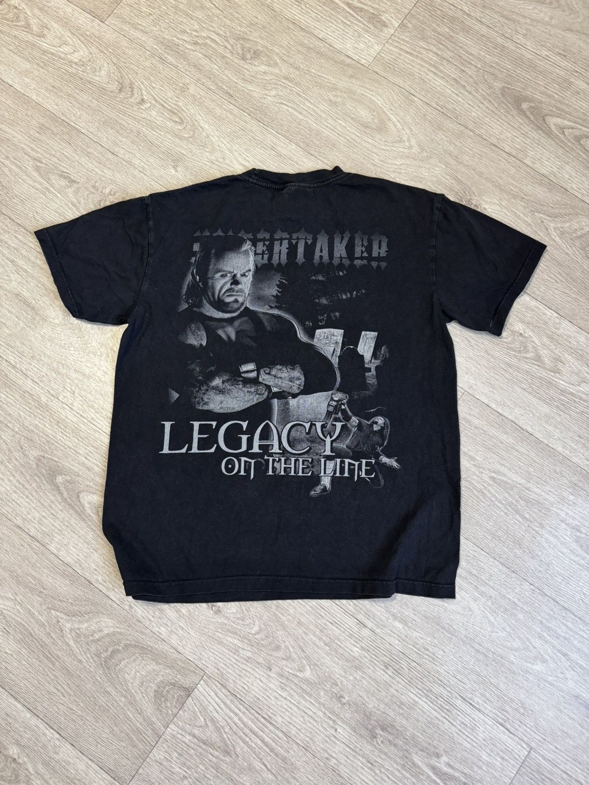WWE 🔷Vintage WWE WWF The Undertaker Legacy On The Line T-shirt🔷 Size US L / EU 52-54 / 3 - 5 Thumbnail