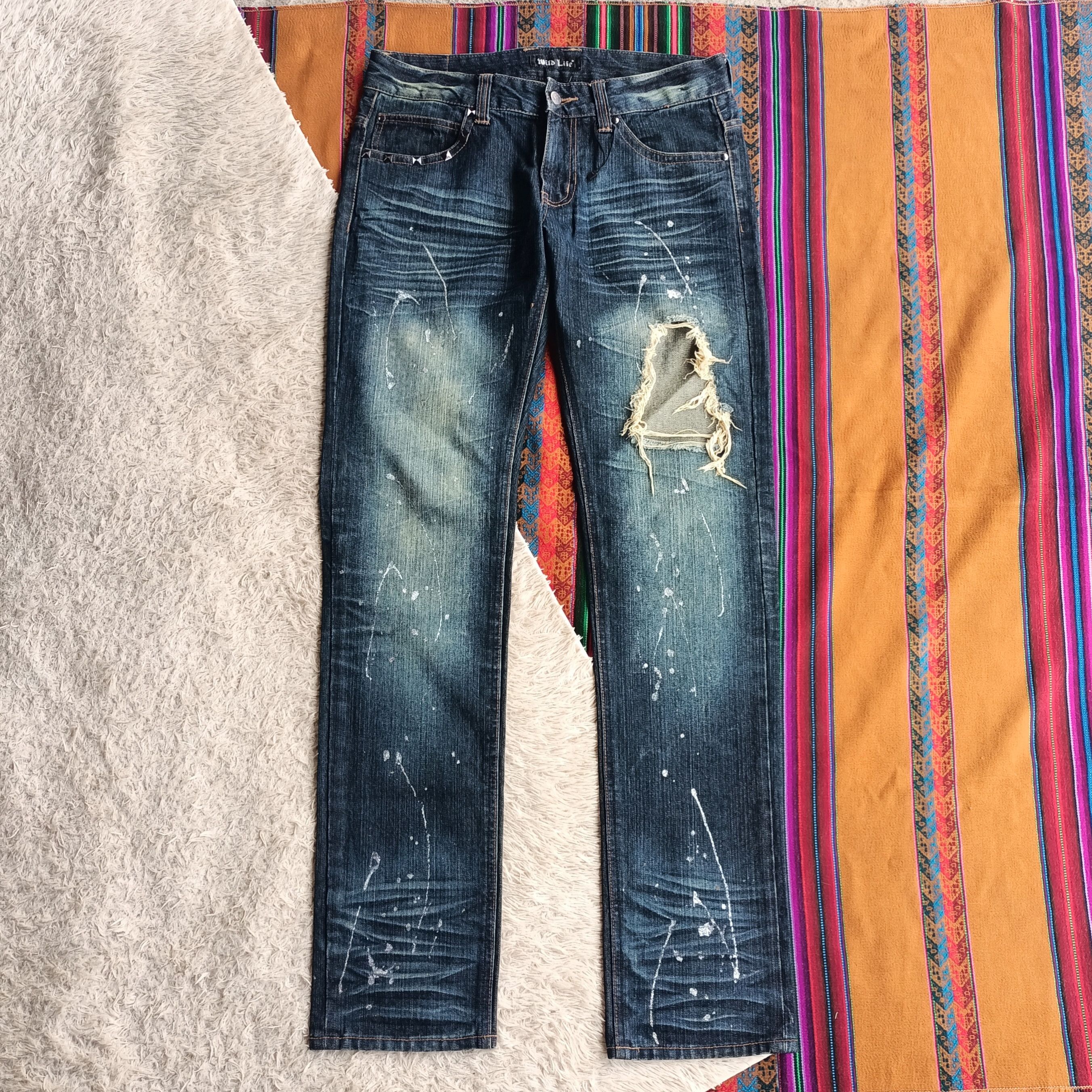 Wild life splas paint distressed jeans