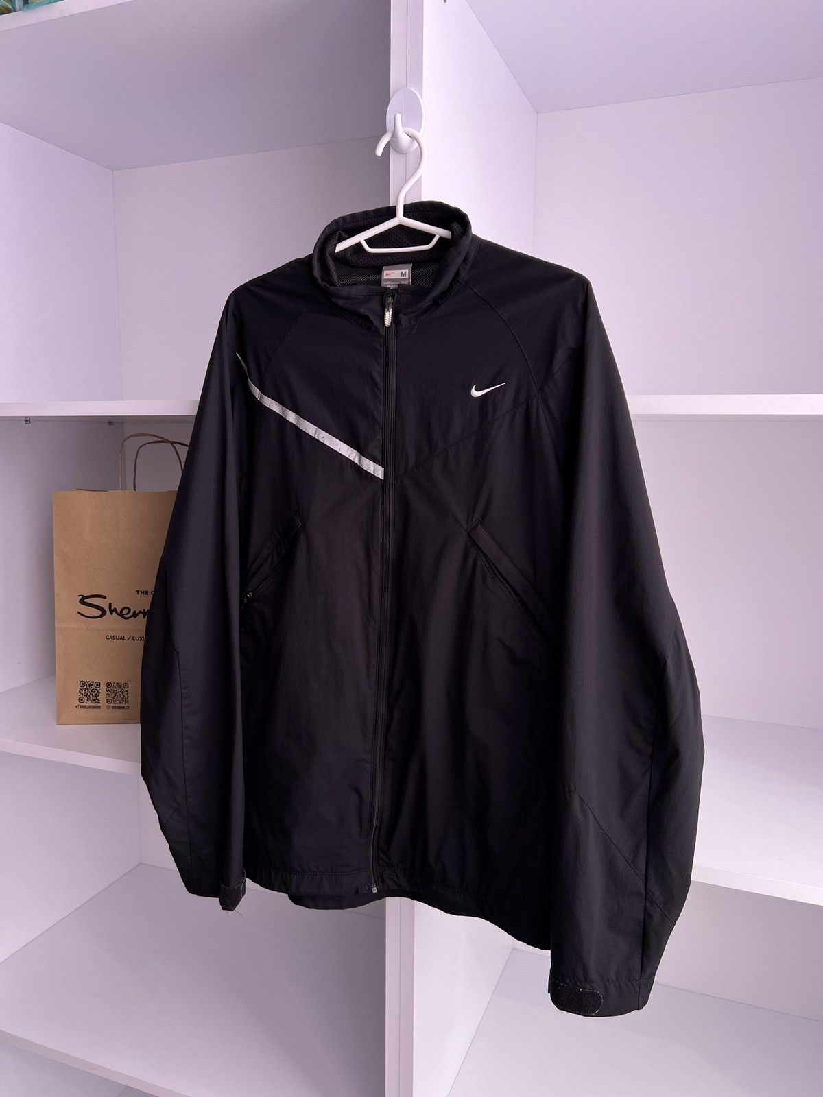 Vintage Nike Light 90s style windbreaker jacket