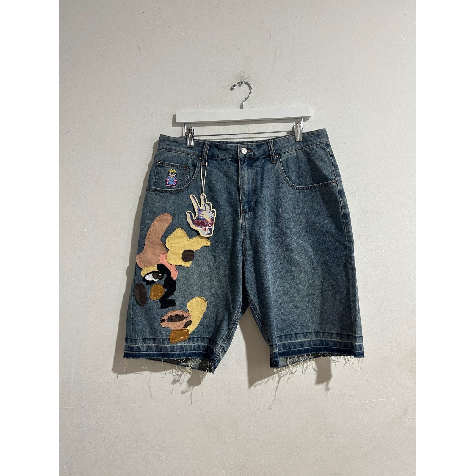 KidSuper KIDSUPER STUDIOS FACE PATCHWORK BAGGY SHORTS SIZE MEDIUM NEW Size US 34 / EU 50 - 1 Thumbnail