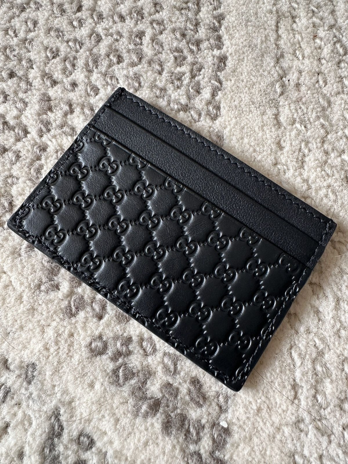 image of Gucci MicroGuccissima Cardholder in Black, Men's