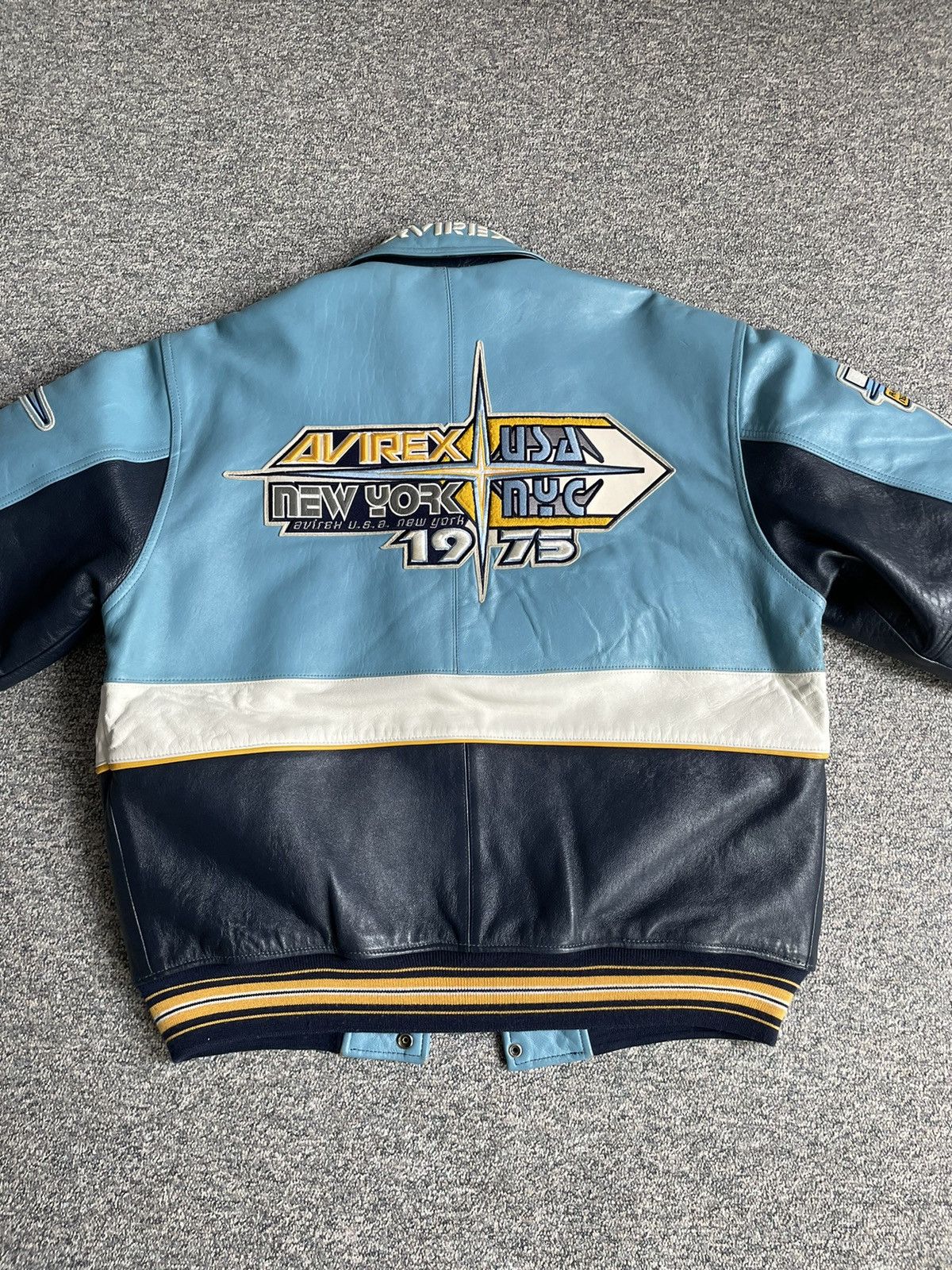 A varsity jacket created by Avilex x Barad , for posterity