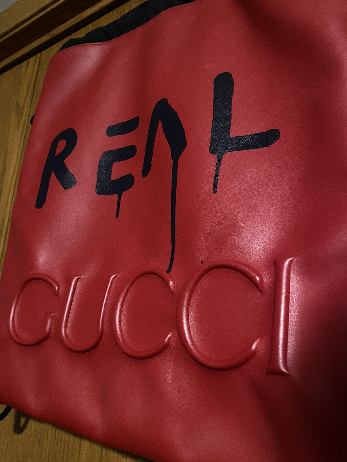 image of Gucci Ghost Real Drawstring Backpack Red Leather, Men's