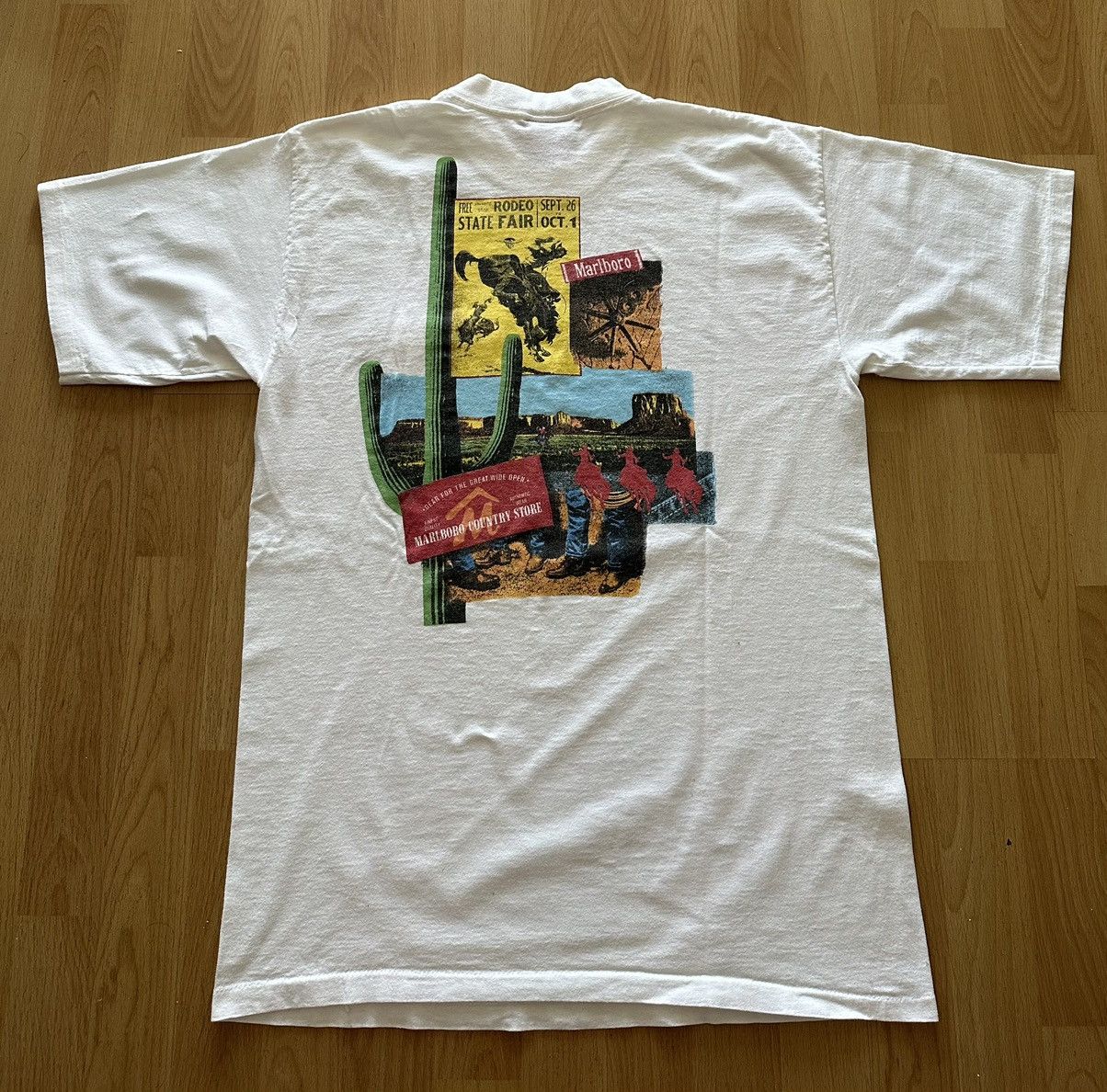 Image of Made In USA x Marlboro Vintage ‘91 Marlboro Cowboy Rodeo Country Store Pocket Tee in White (Size XL