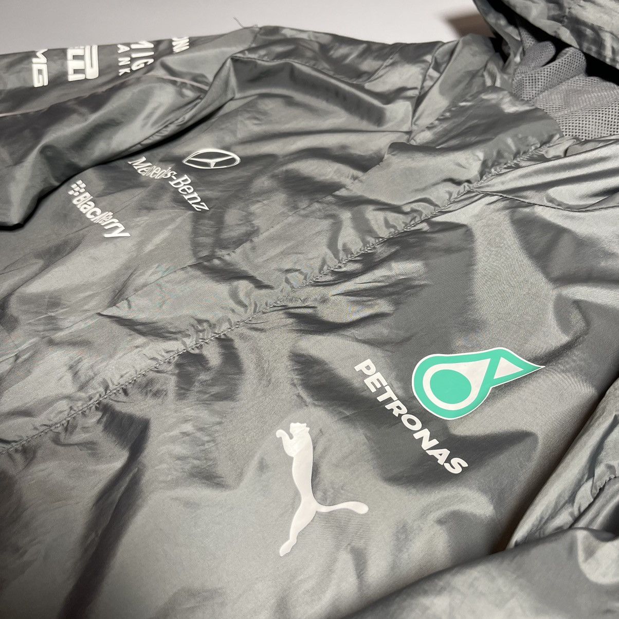 Formula 1 × Mercedes-Benz × Puma MERCEDES BENZ PUMA 2014 F1 PETRONAS AMG MESH LINES JACKET Size US M / EU 48-50 / 2 - 4 Thumbnail