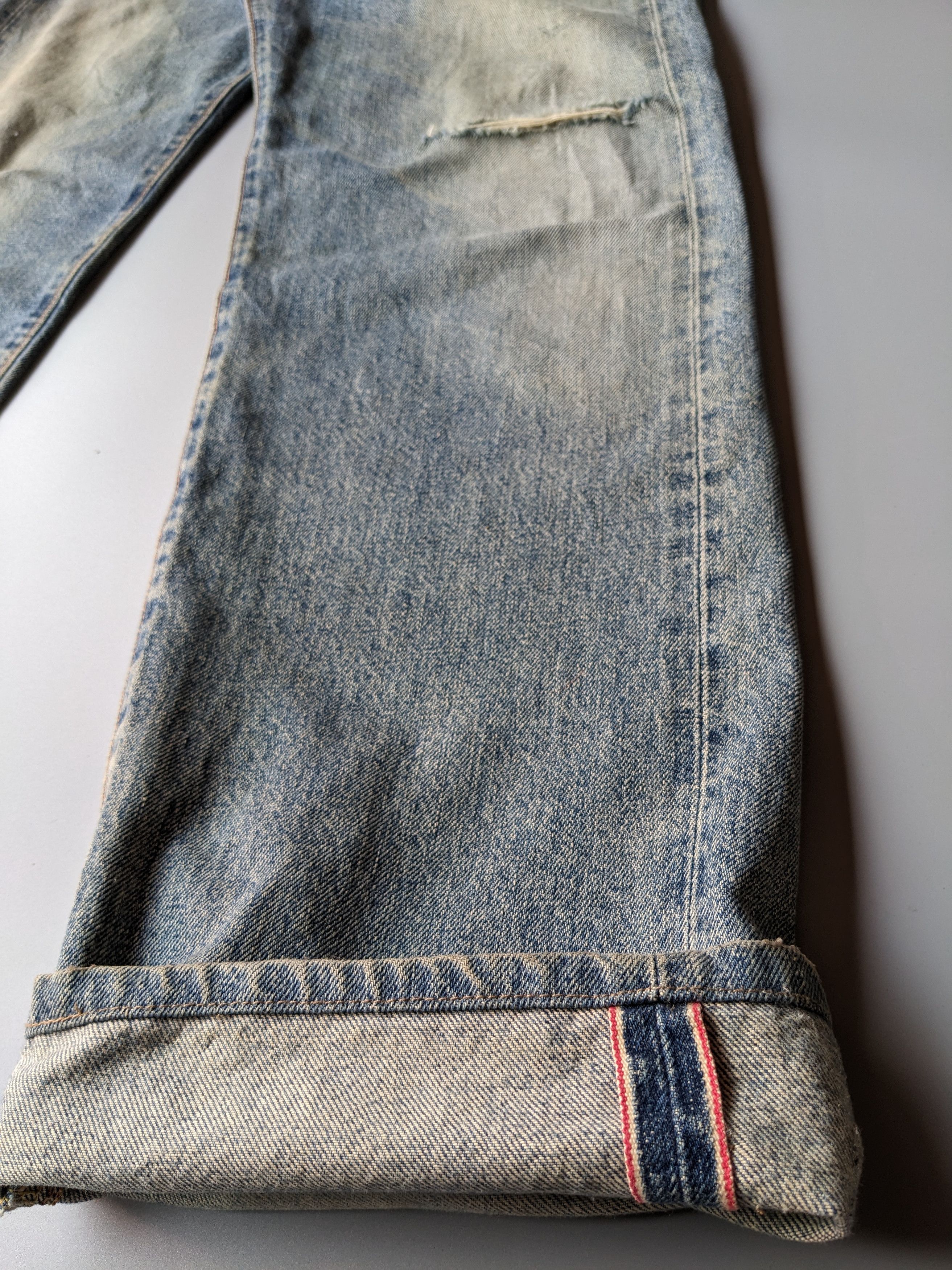 Edwin 505x faded blue distressed selvedge jeans