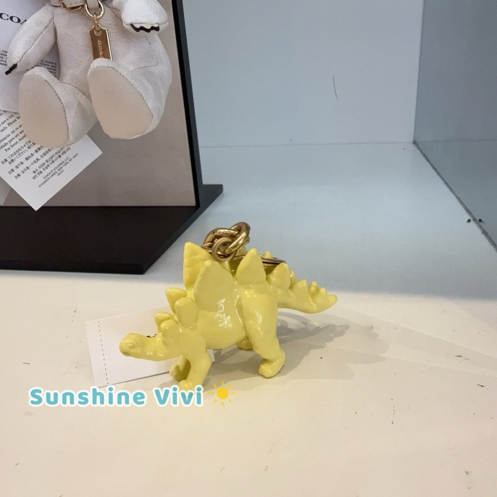 Coach NWT Coach CAX77 Keychain Stegosaurus Bag Charm Brass/Yellow Size ONE SIZE - 1 Thumbnail