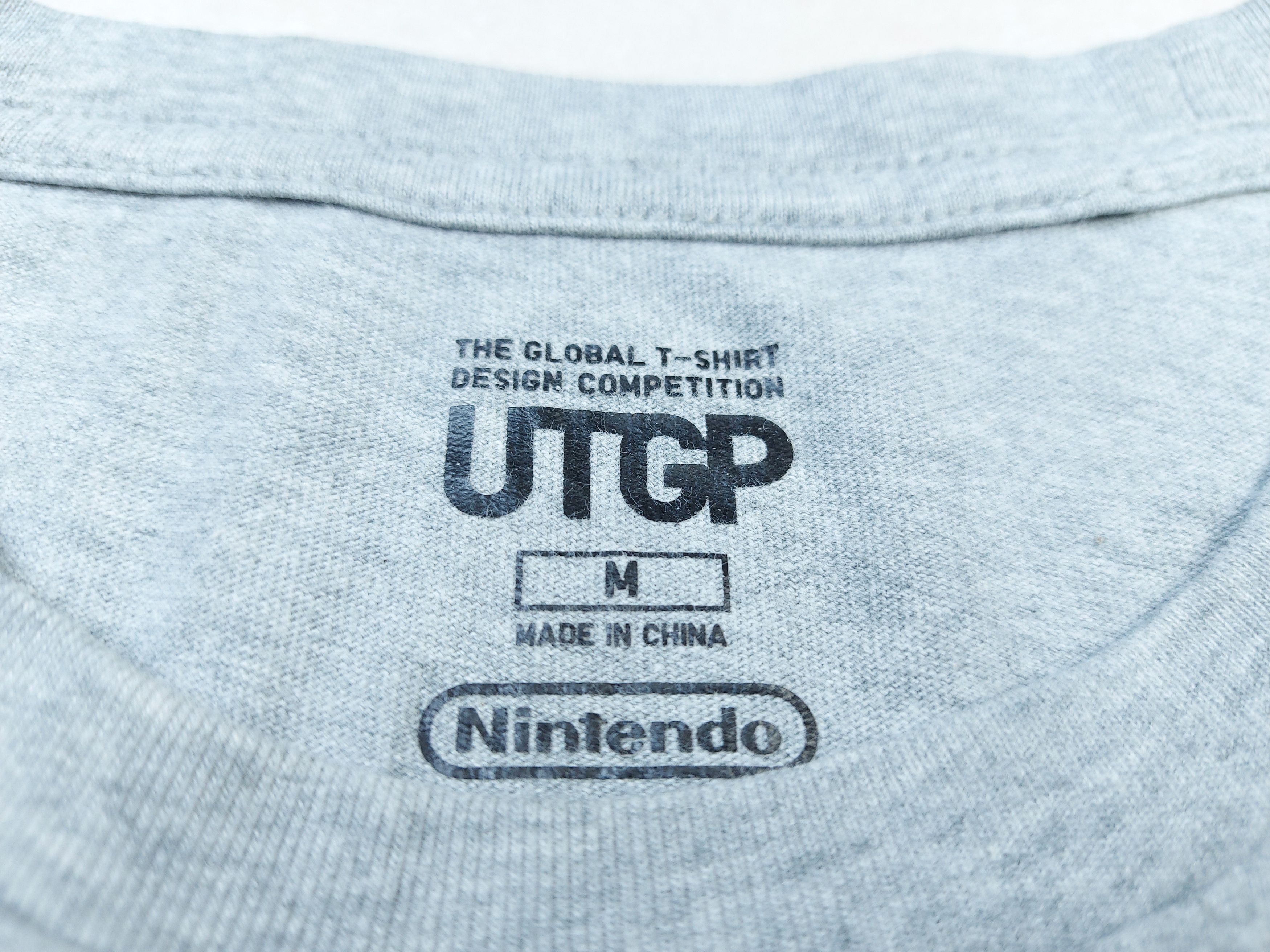 Nintendo × Pokemon × Uniqlo Uniqlo Nintendo Pokemon Pikachu UTGP 2017 Double-Sided TEE Size US M / EU 48-50 / 2 - 8 Thumbnail