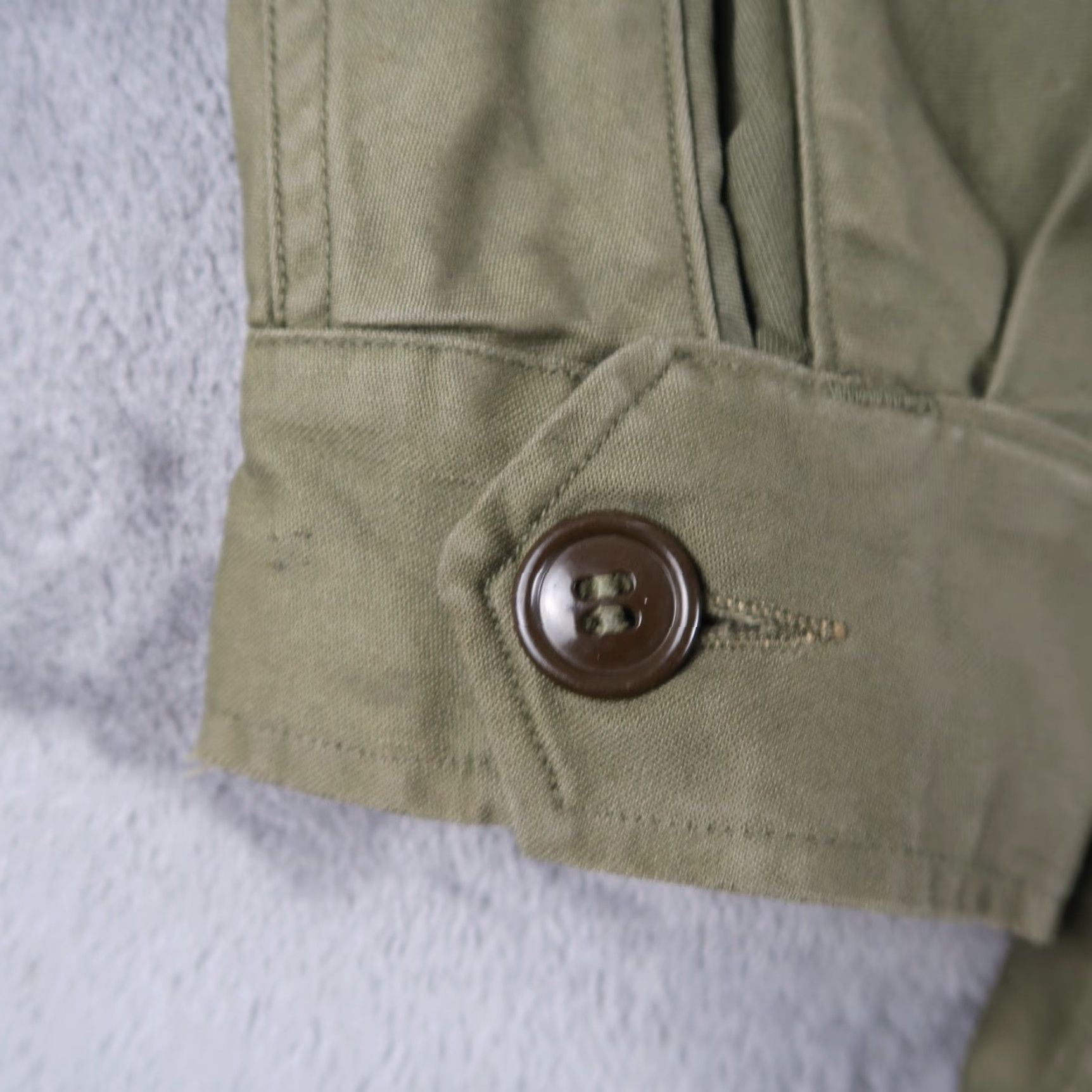 Olive VINTAGE US Army M43 Jacket Mens 34L Olive Green Military Jacket Cotton Canvas Mid-Length Green 40s WW2 Army Size US M / EU 48-50 / 2 - 4 Thumbnail