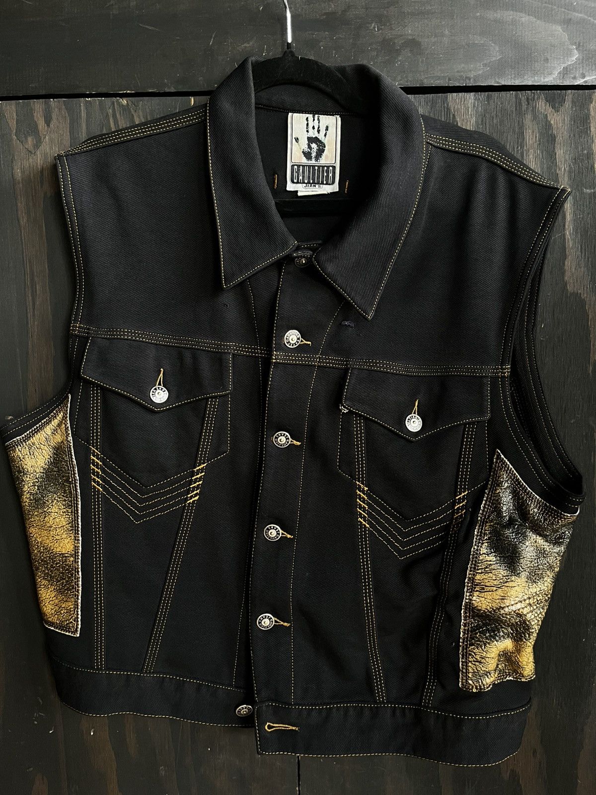 Old JPG jeans vest. Cool hardware leather panels