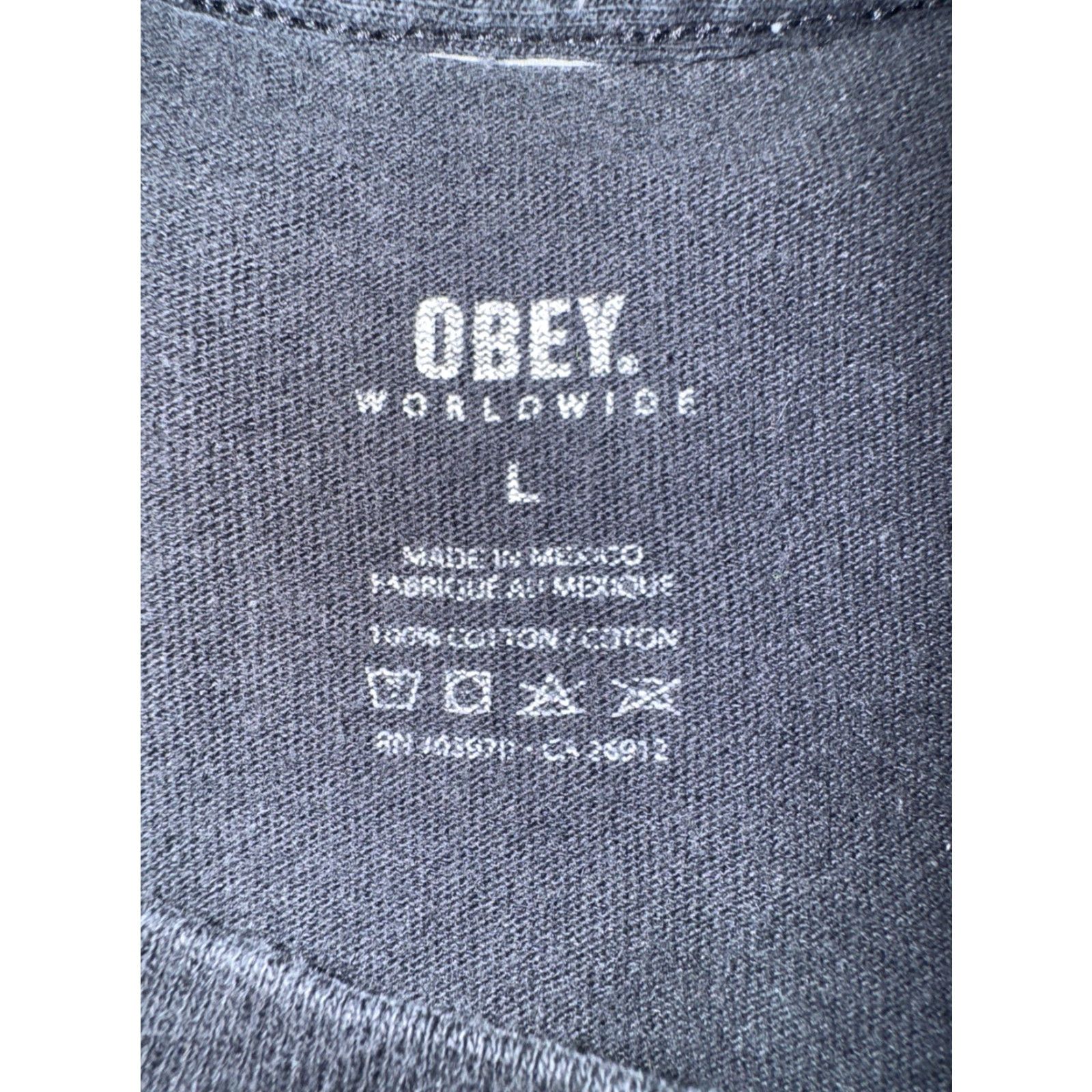 Obey VINTAGE Obey Angel Graphic T-Shirt Black Large Streetwear 90s Mens T-Shirt Clothing Obey Angel Graphic Print Crew Neck Short Sleeve Cotton 20x26 Size US L / EU 52-54 / 3 - 3 Thumbnail