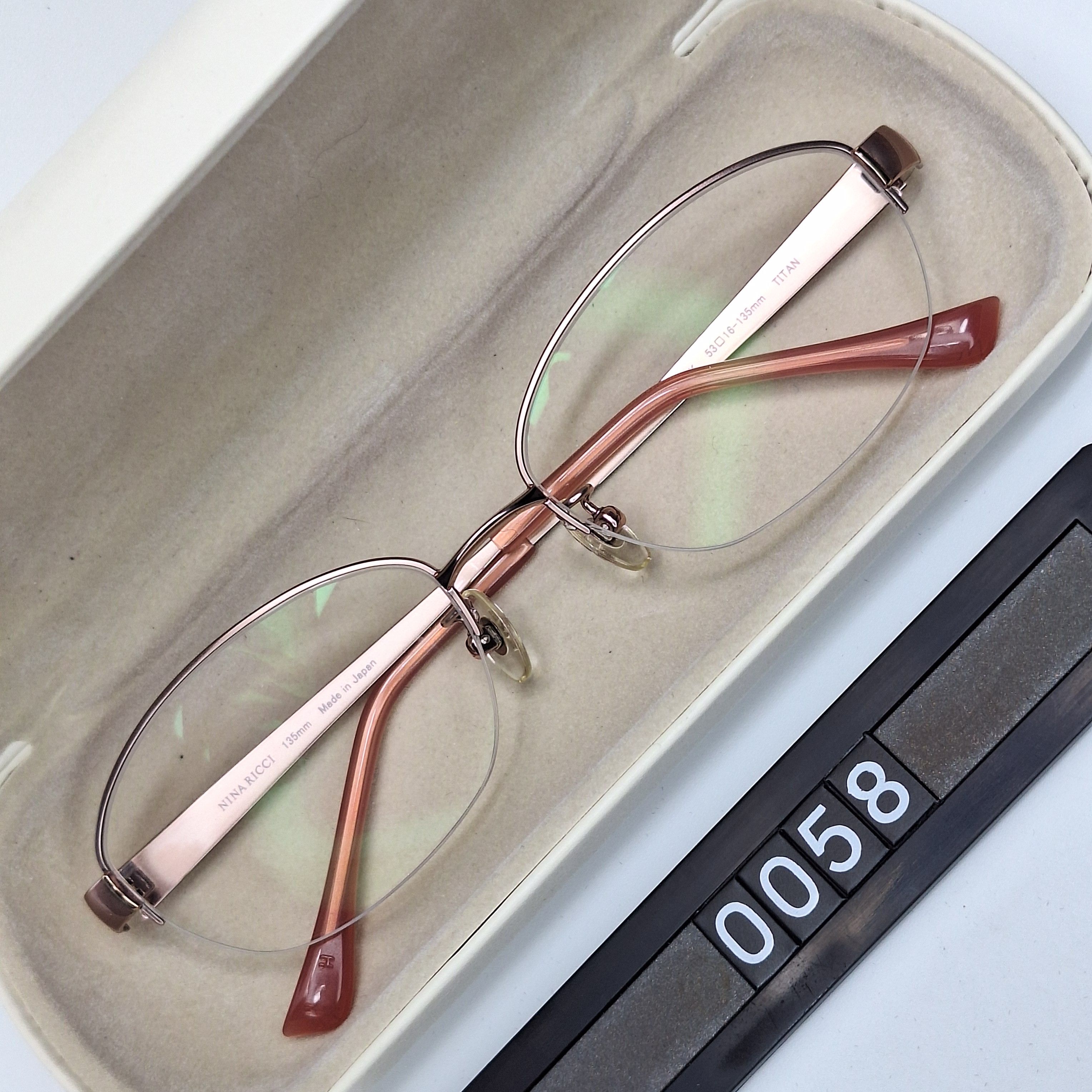 Nina Ricci NINA RICCI NR27527 Pink Gold Titan Half-Rimless Eyeglasses Size ONE SIZE - 1 Thumbnail