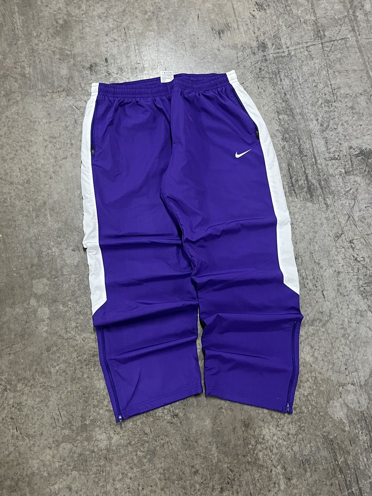 Purple nike track pants online