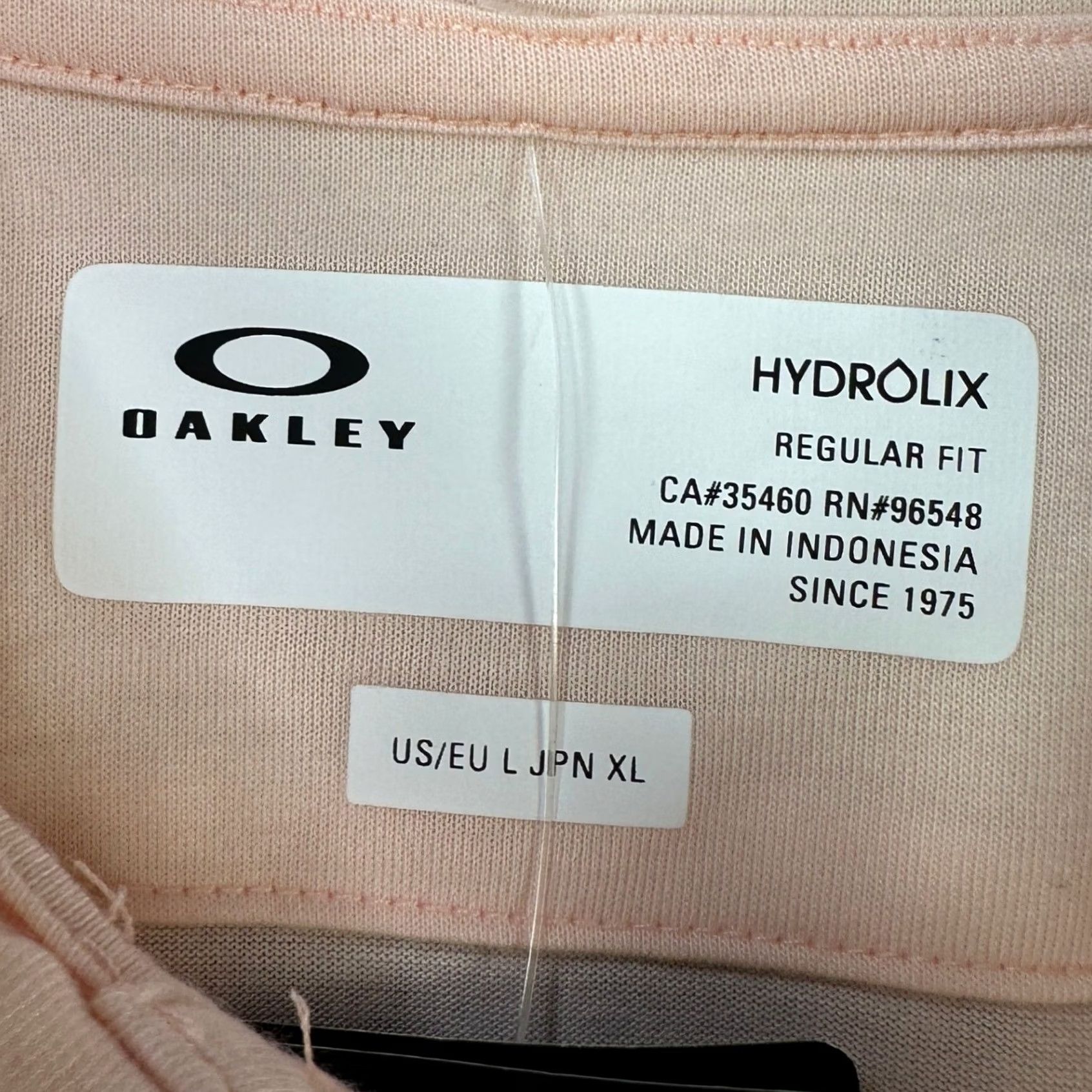 Oakley Oakley Hydrolix Polo Shirt Mens Golf Shirt Short Sleeve Large Orange Pastel Rugby Performance NEW Size US L / EU 52-54 / 3 - 4 Thumbnail