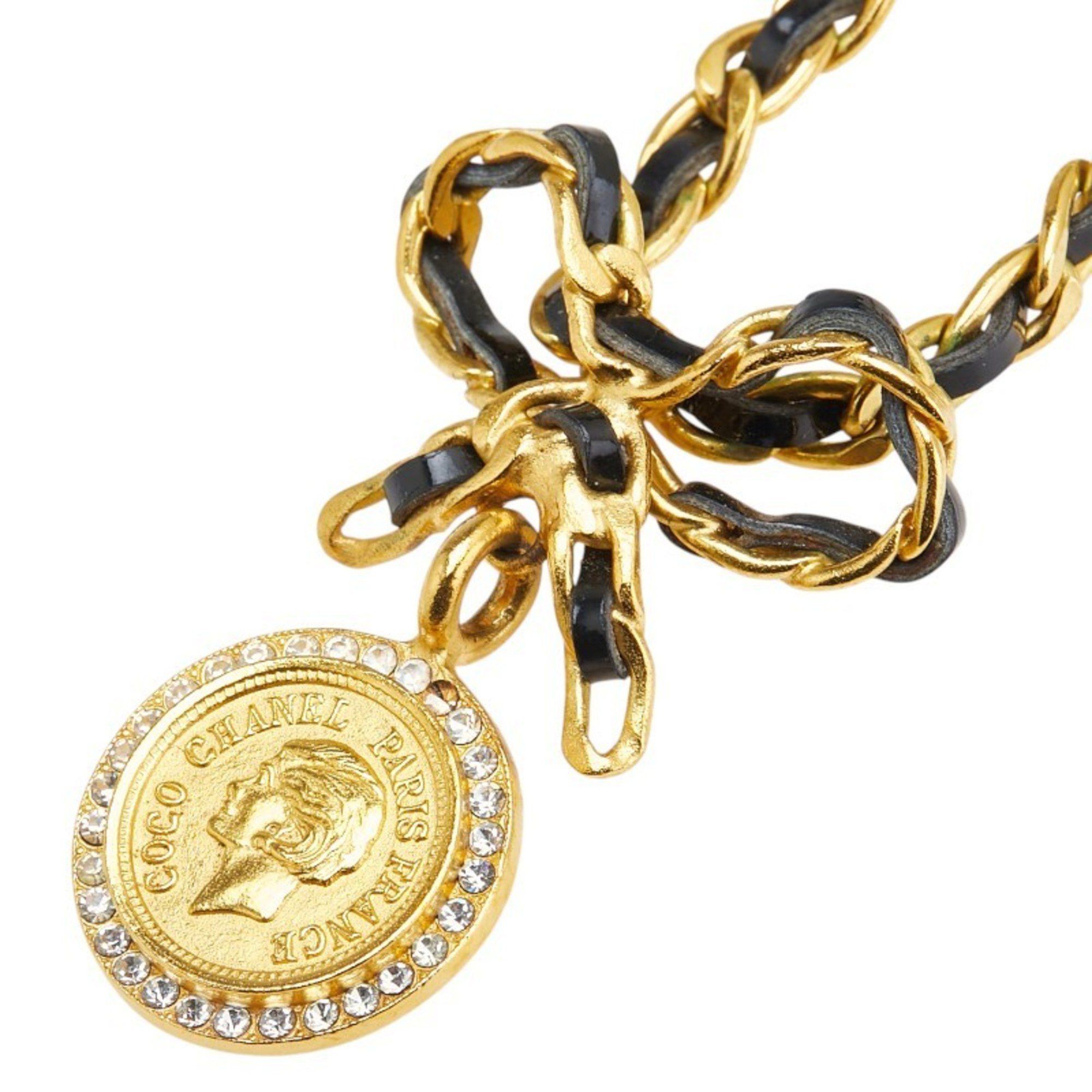 Vintage Chanel coin ribbon rhinestone choker necklace gold plated for women.