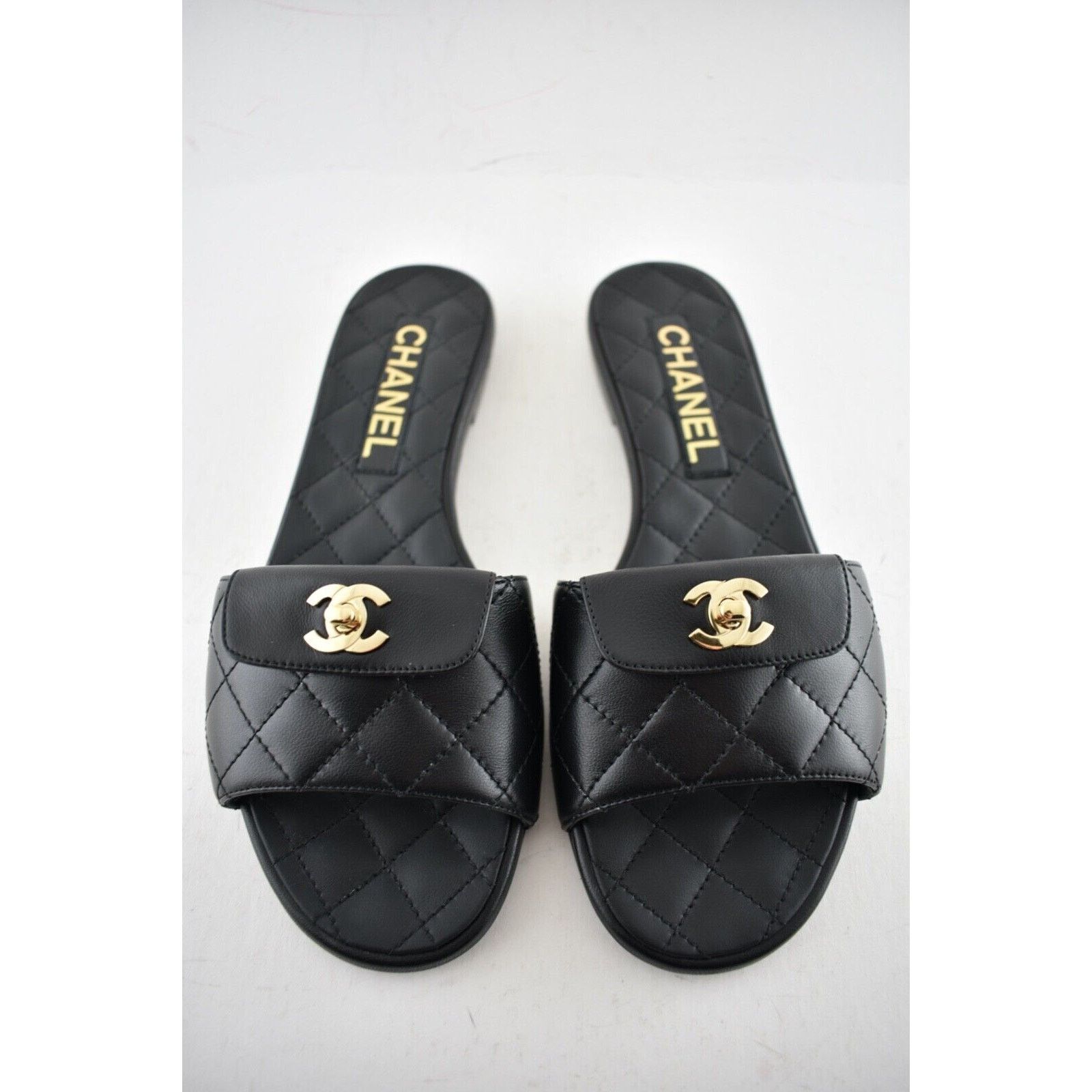 Chanel REV Black Turnlock Quilted Gold CC Logo Mules Slide