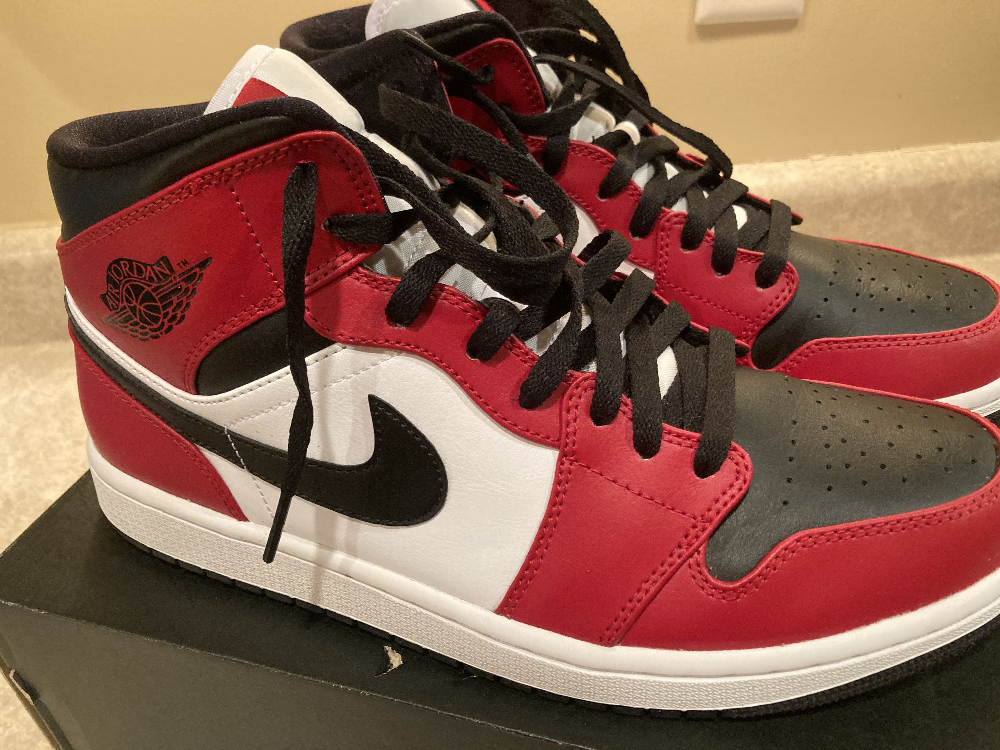 image of Jordan Brand 1 Mid Chicago Toe Shoes in Black/Gym Red/White, Men's (Size 11)