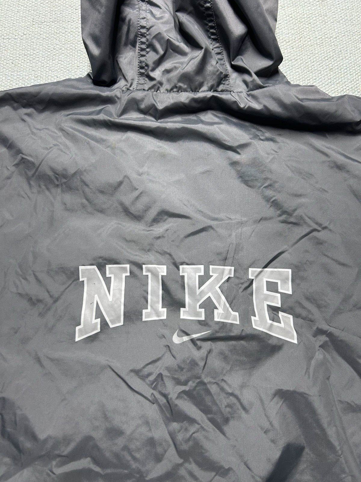 Vintage Vintage Nike hooded jacket windbreaker spell out swoosh XL Size US XL / EU 56 / 4 - 9 Thumbnail