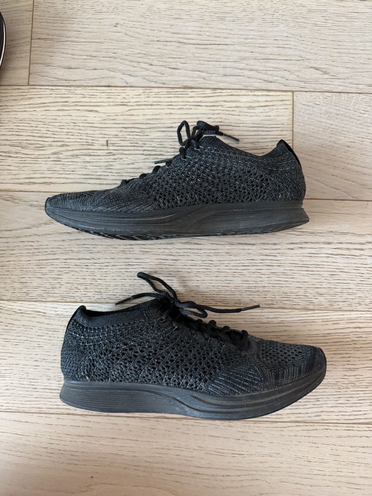 Nike Flyknit Racer ‘Triple Black’ US6.5 Size US 6.5 / EU 39-40 - 1 Thumbnail