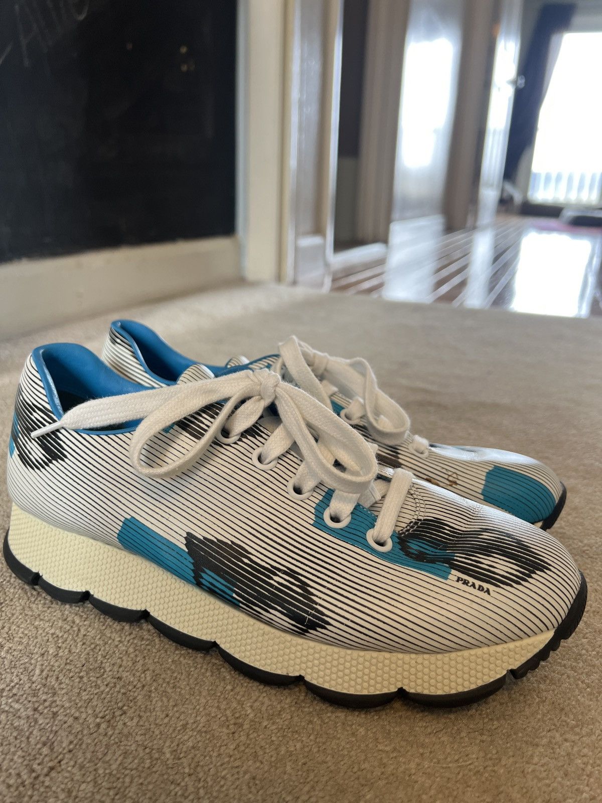 image of Prada Lip Sneakers in White, Men's (Size 6.5)