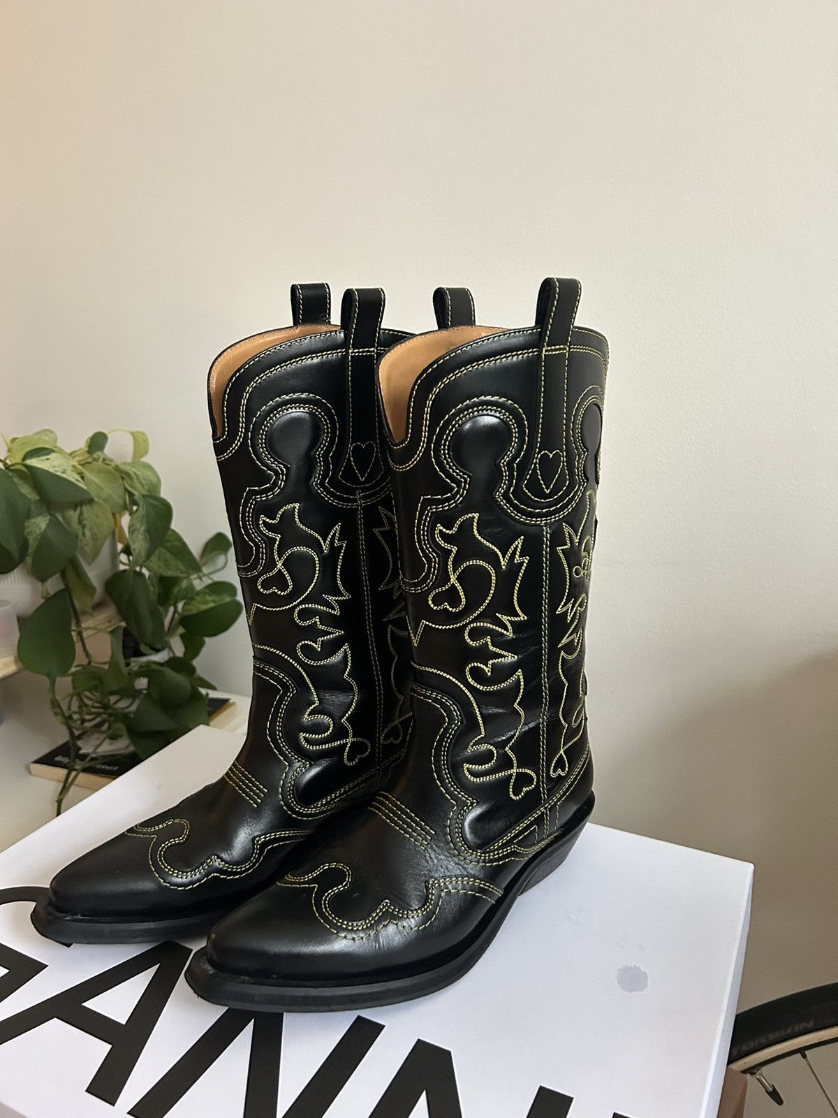 GANNI black cowboy boots yellow stitches